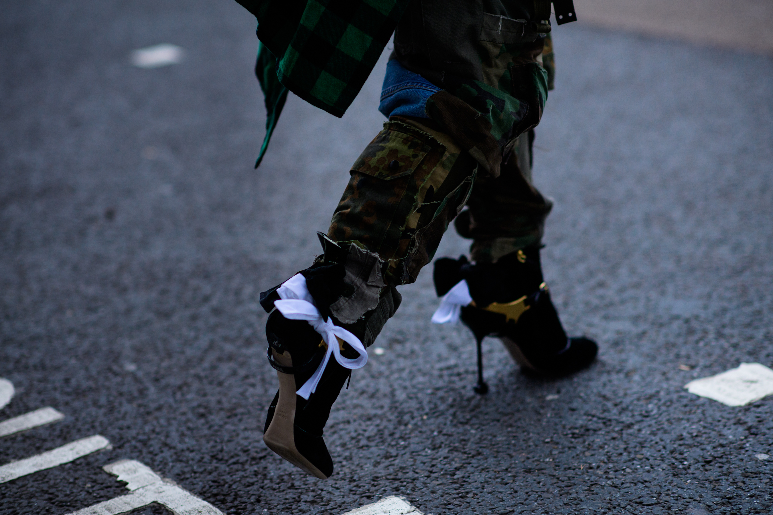 Woman with broken high heels
