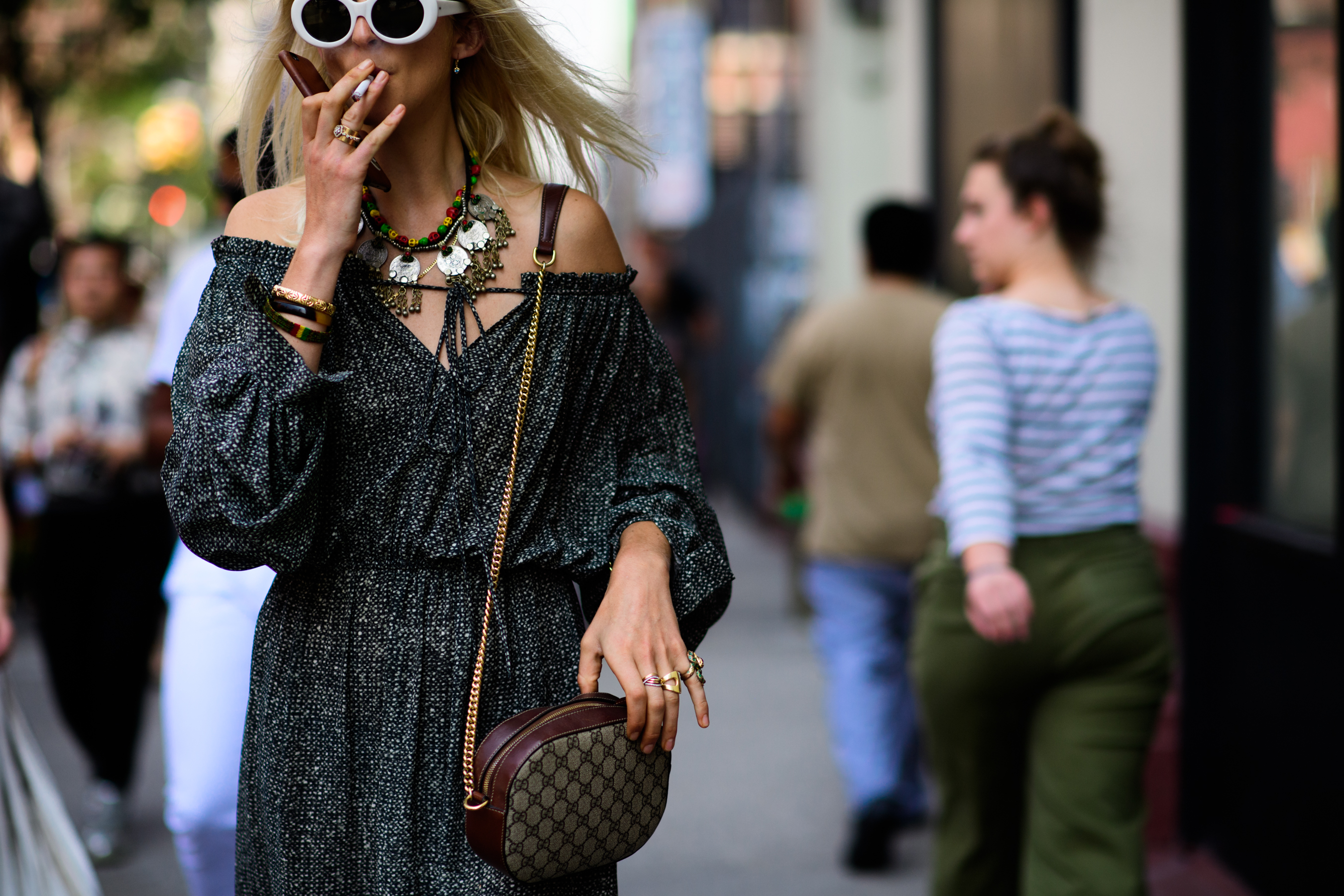 Woman wearing dress and Gucci bag