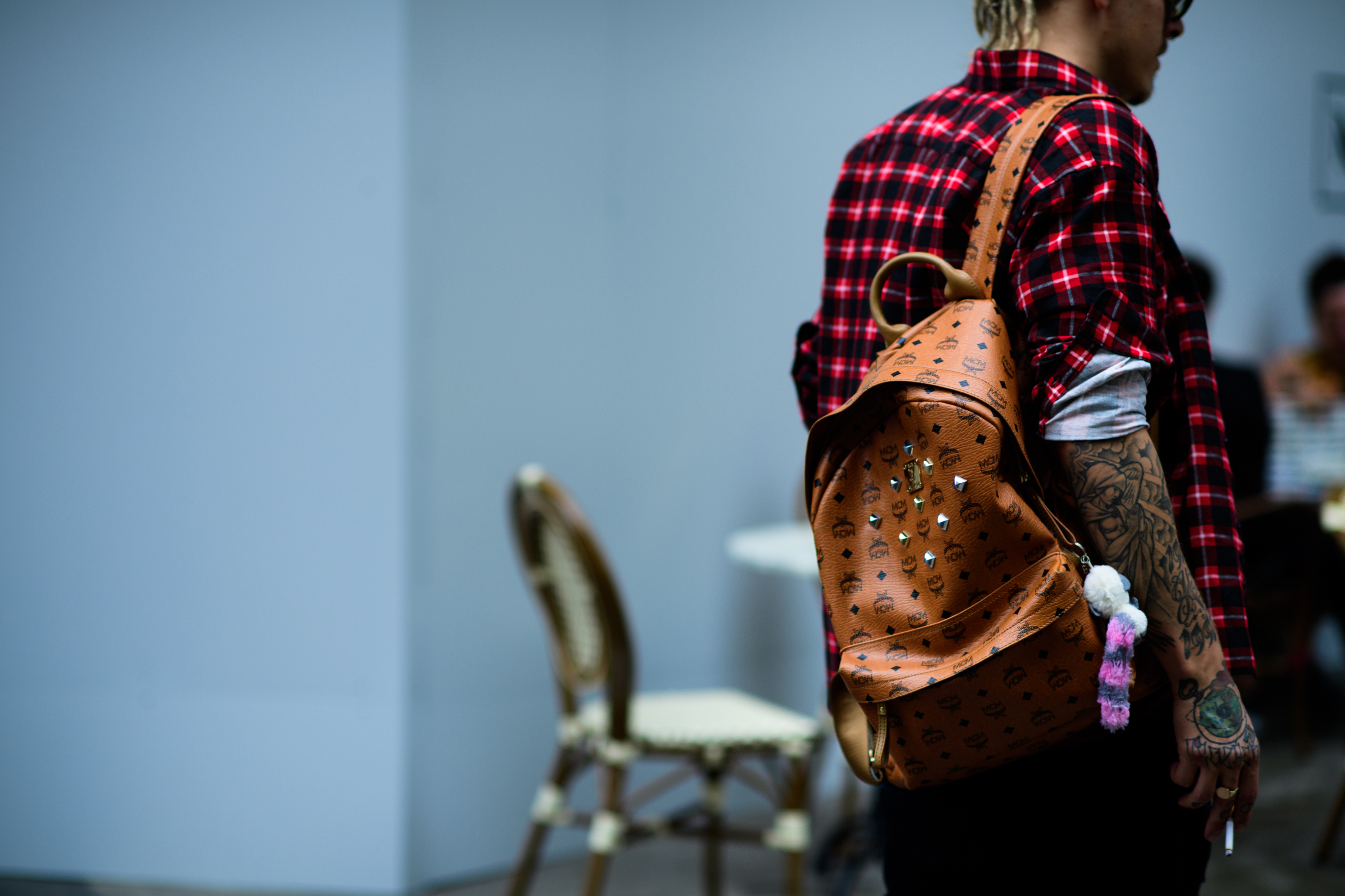 Man with MCM backpack after the show