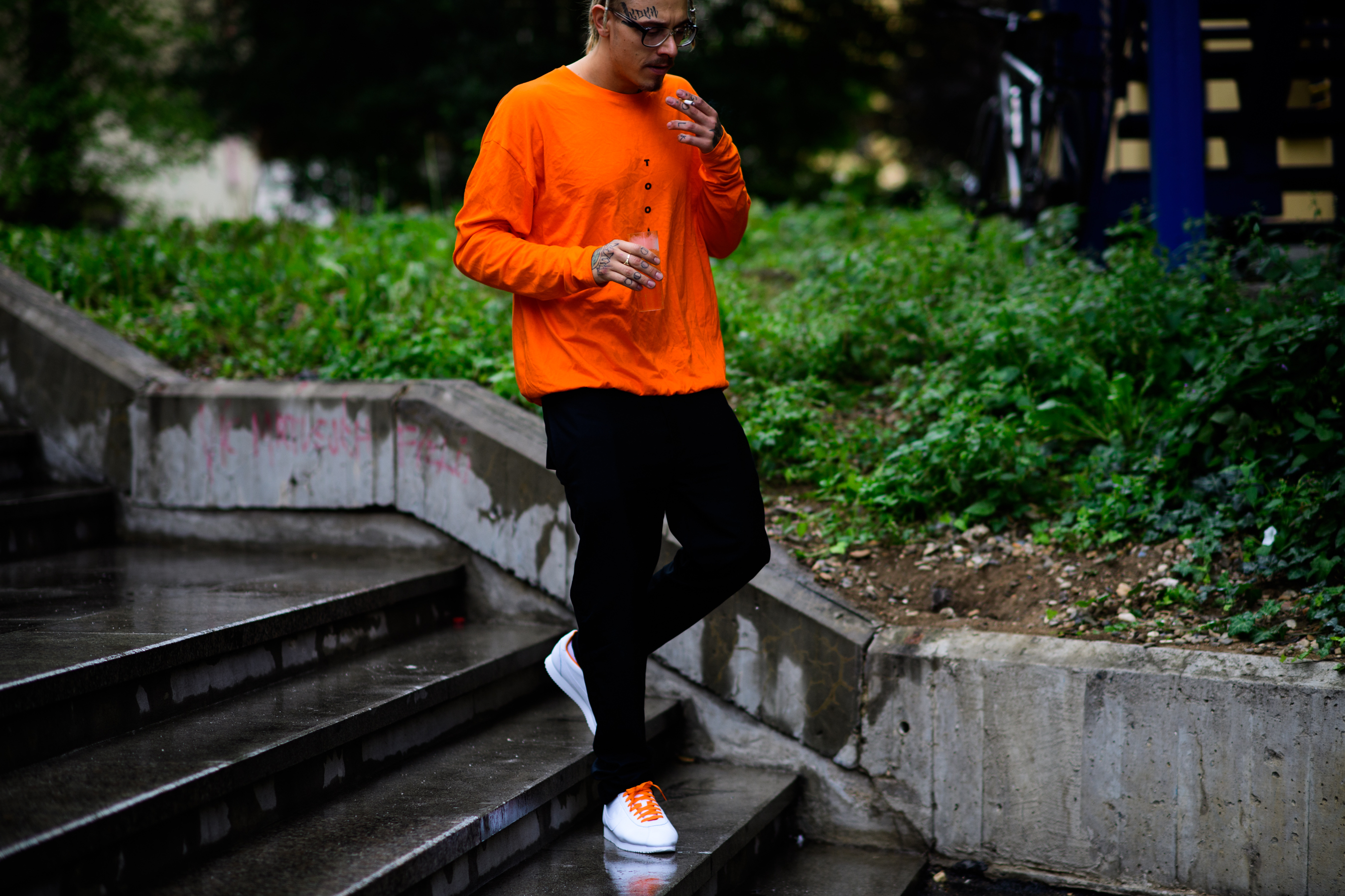 Man wearing bright orange longsleeve