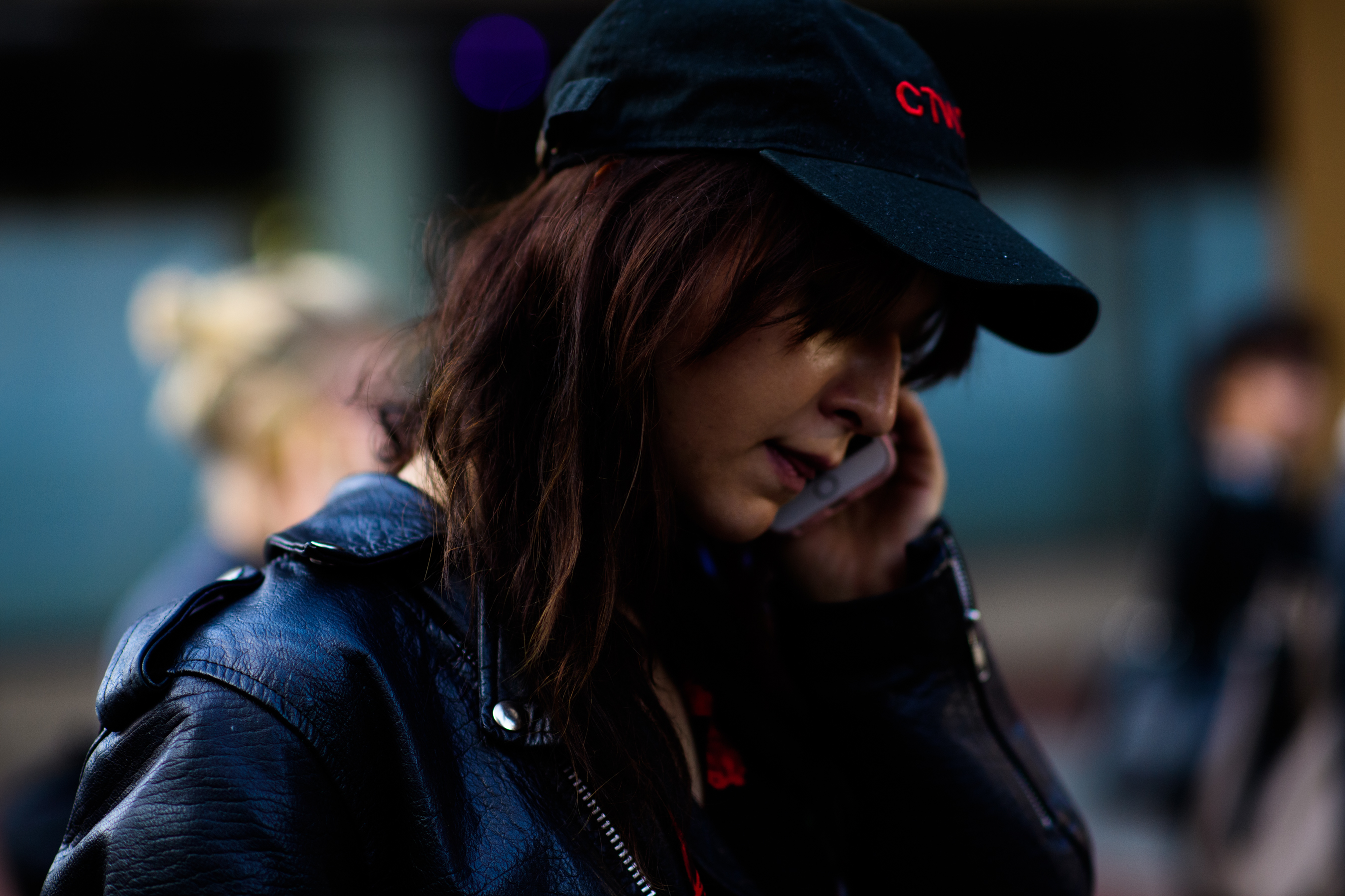 Woman wearing Heron Preston hat