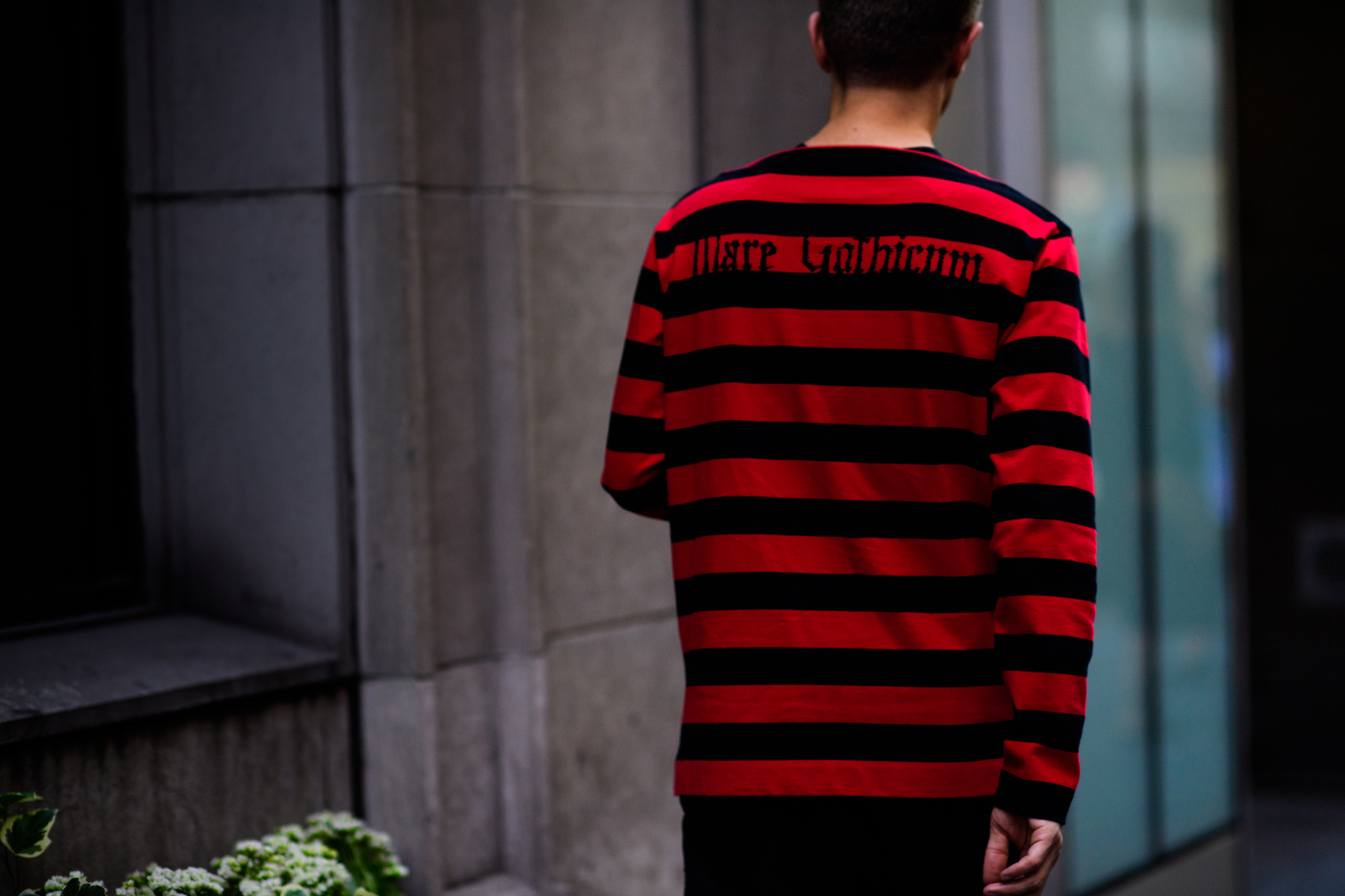 Man wearing red and black longsleeve