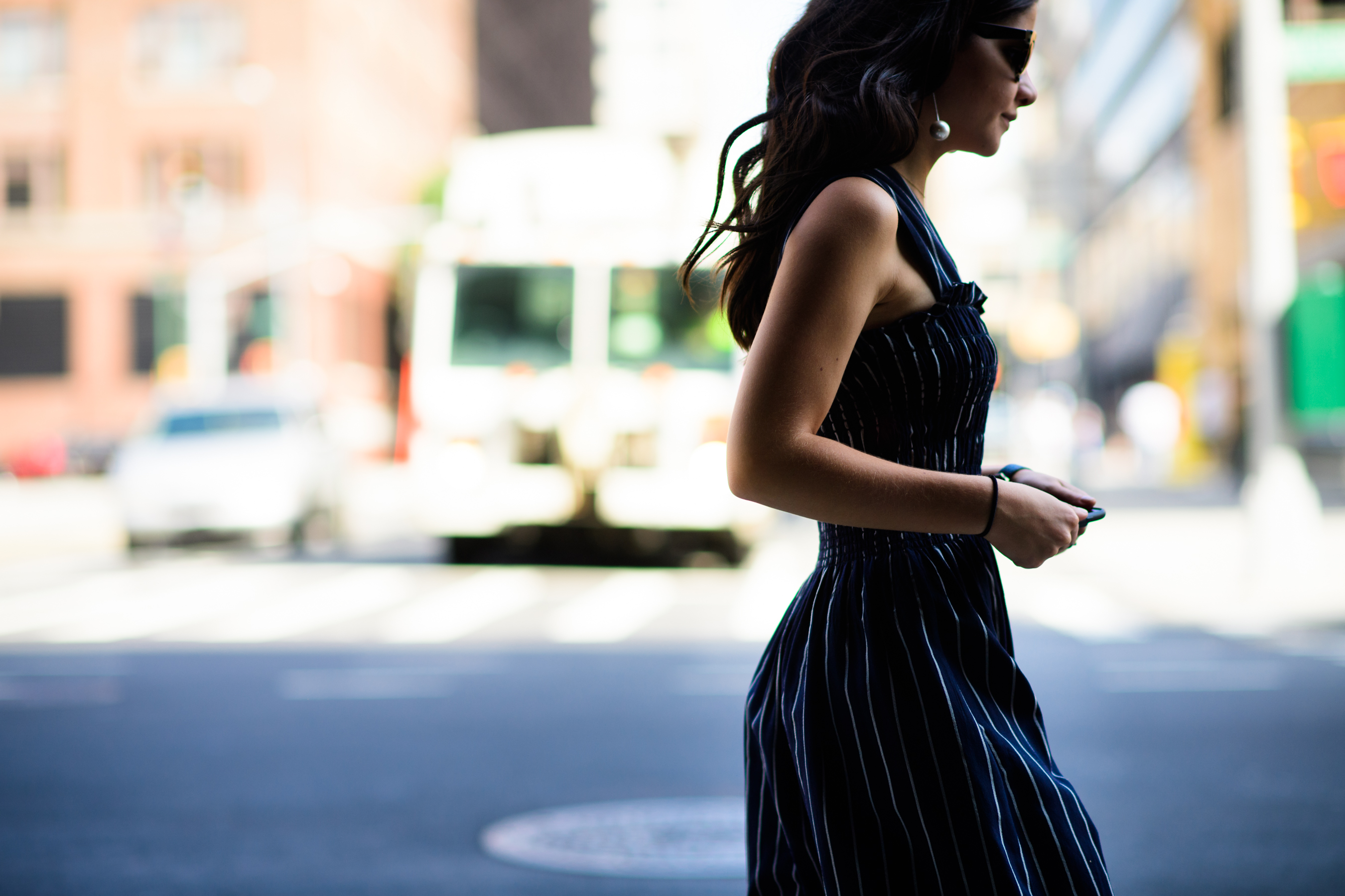 Woman wearing dress and earrings