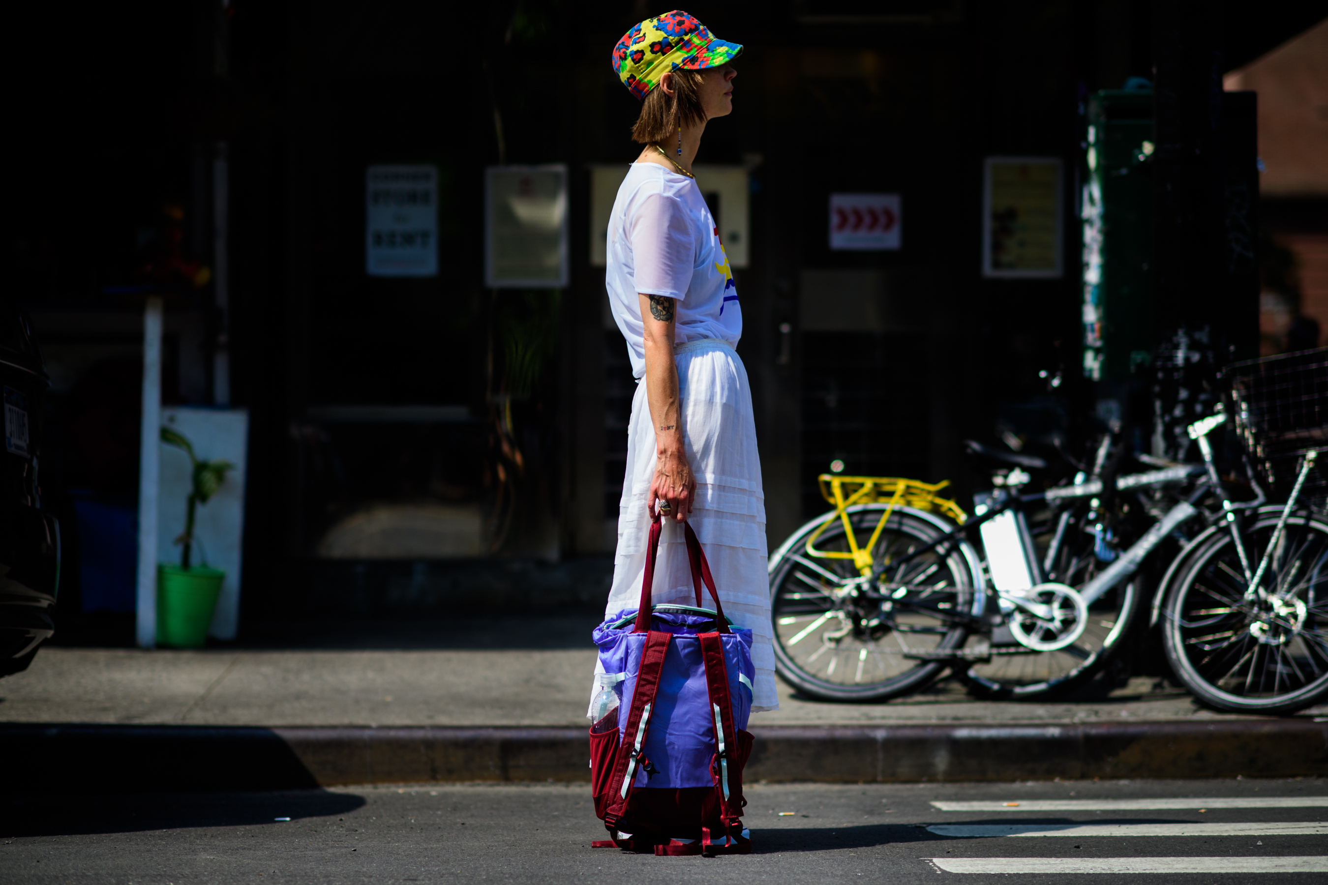 Fashion journalist wearing colourful hat