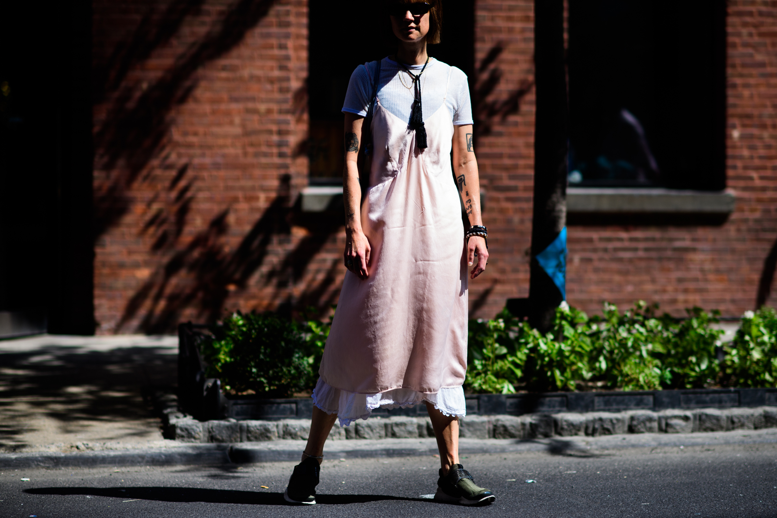 Fashion journalist wearing pink dess