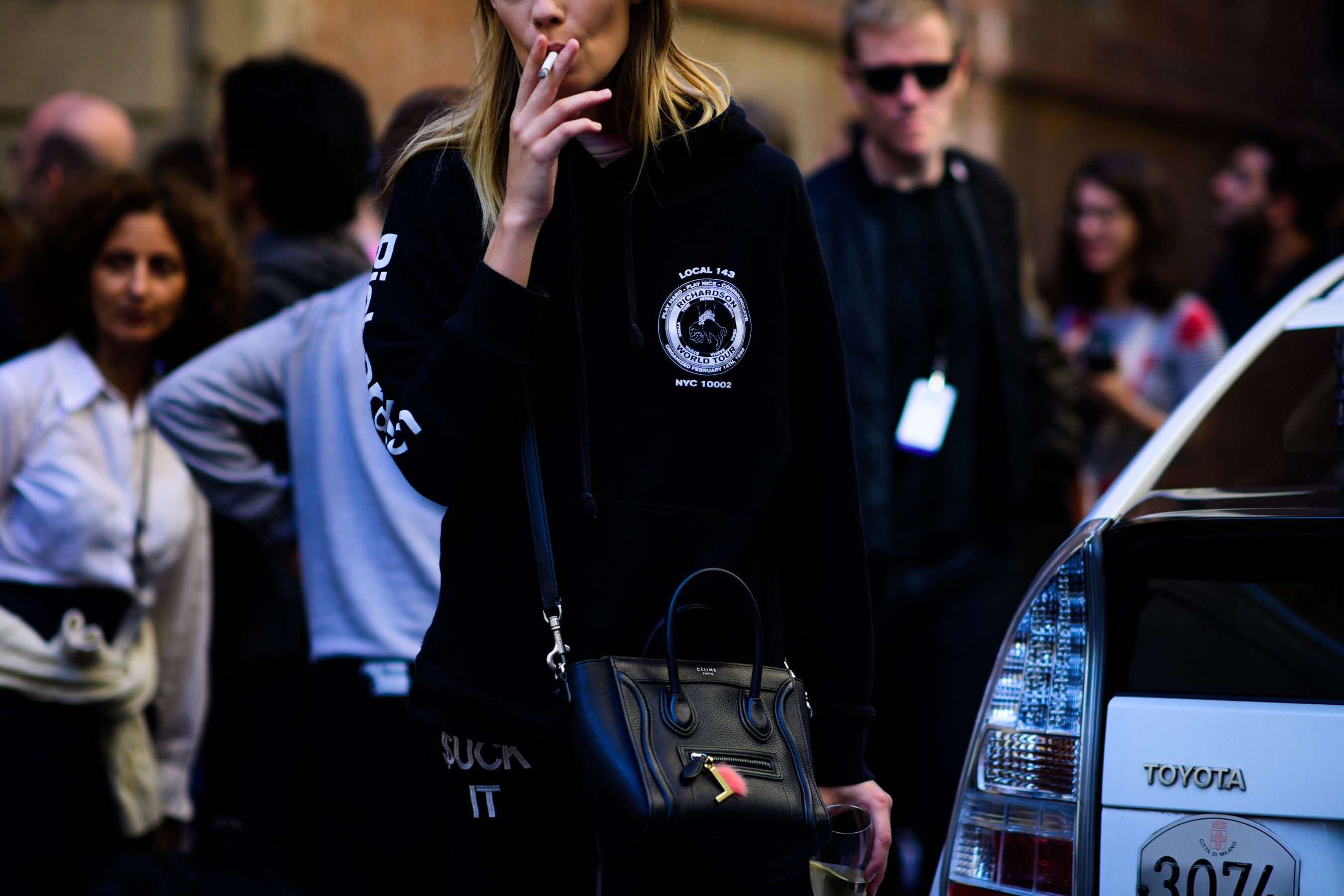 Model smoking after the show