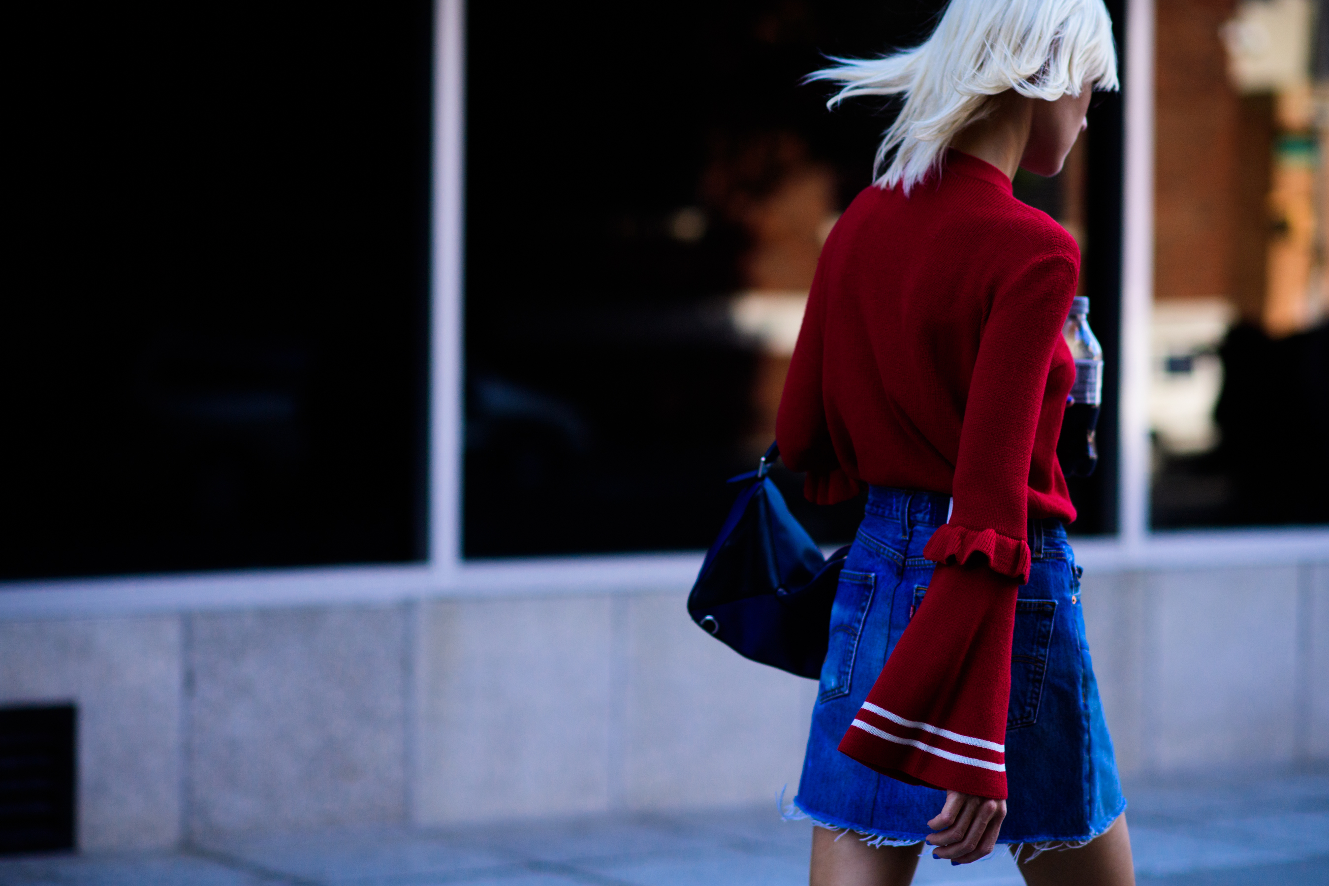Blogger wearing red sweater