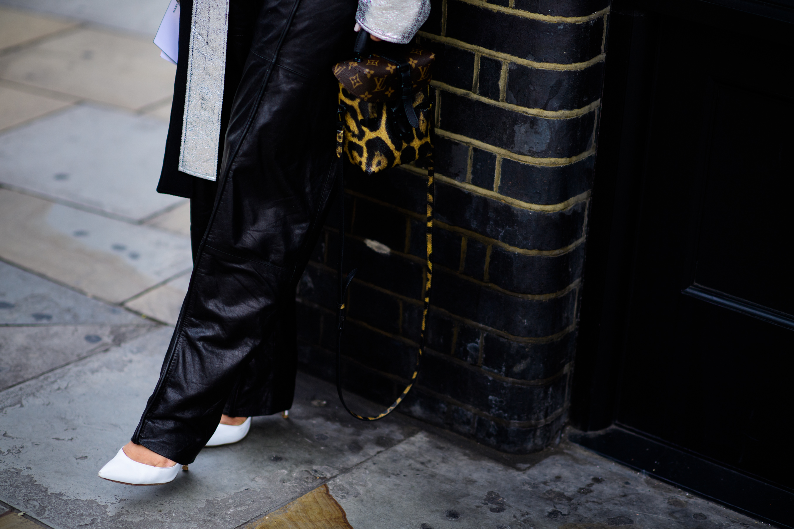 Woman wearing black leather pants