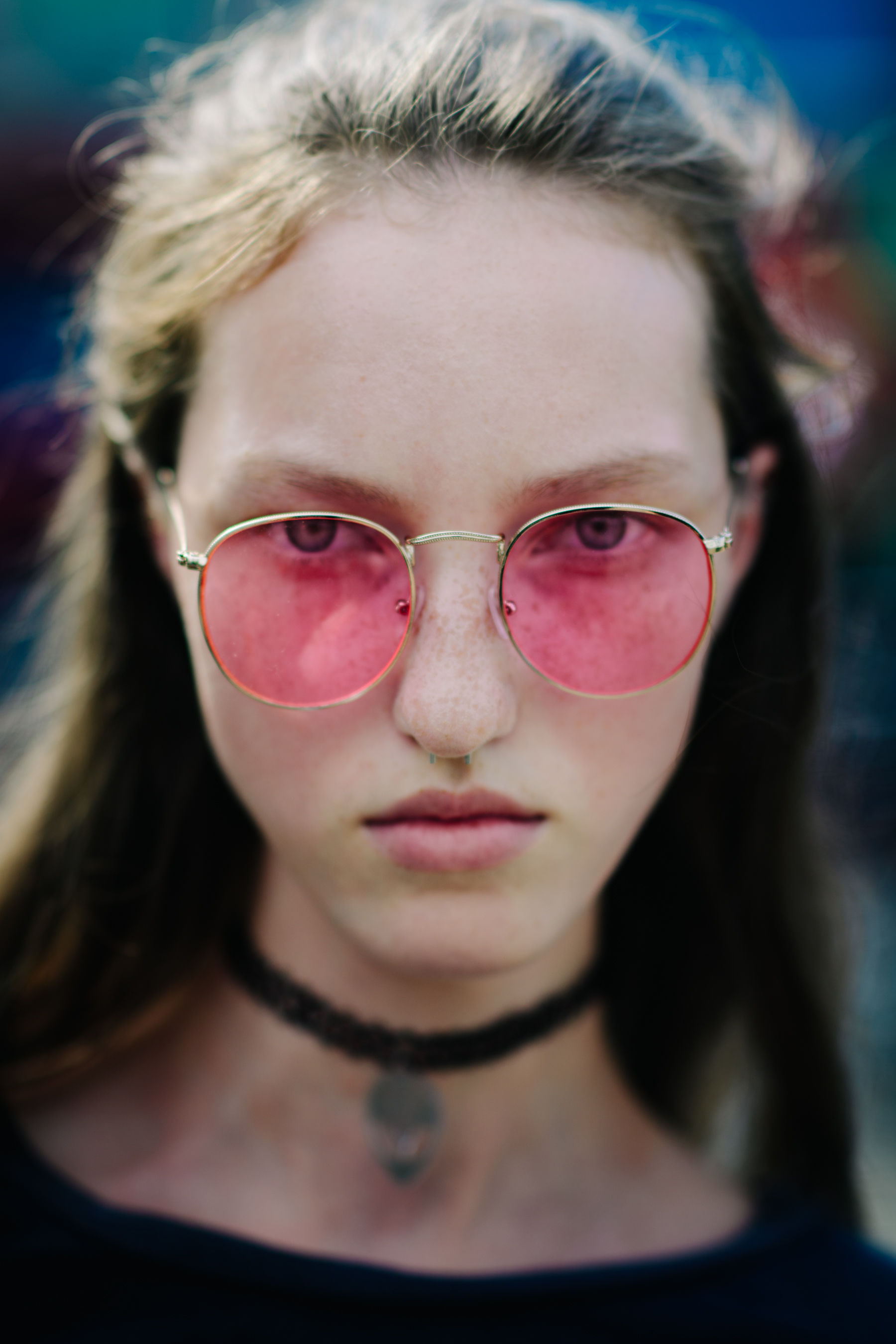 Portrait of Russian model pink glasses