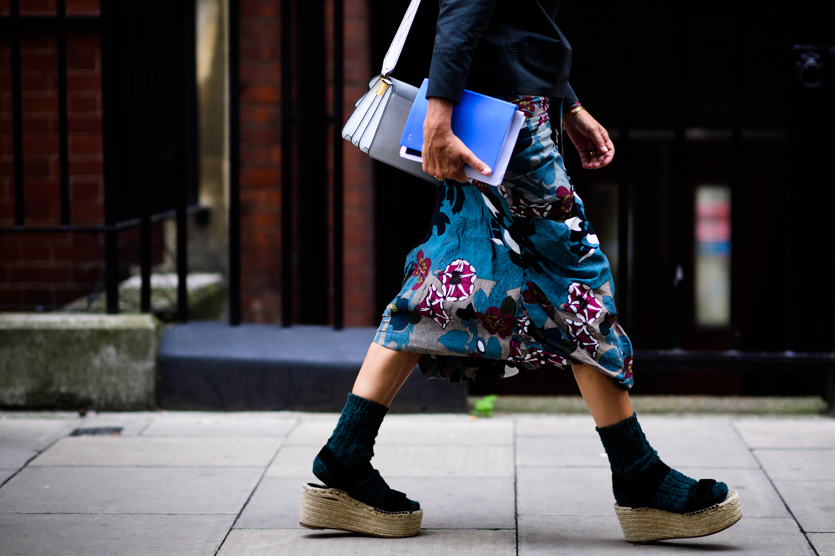 Woman wearing long blue skirt