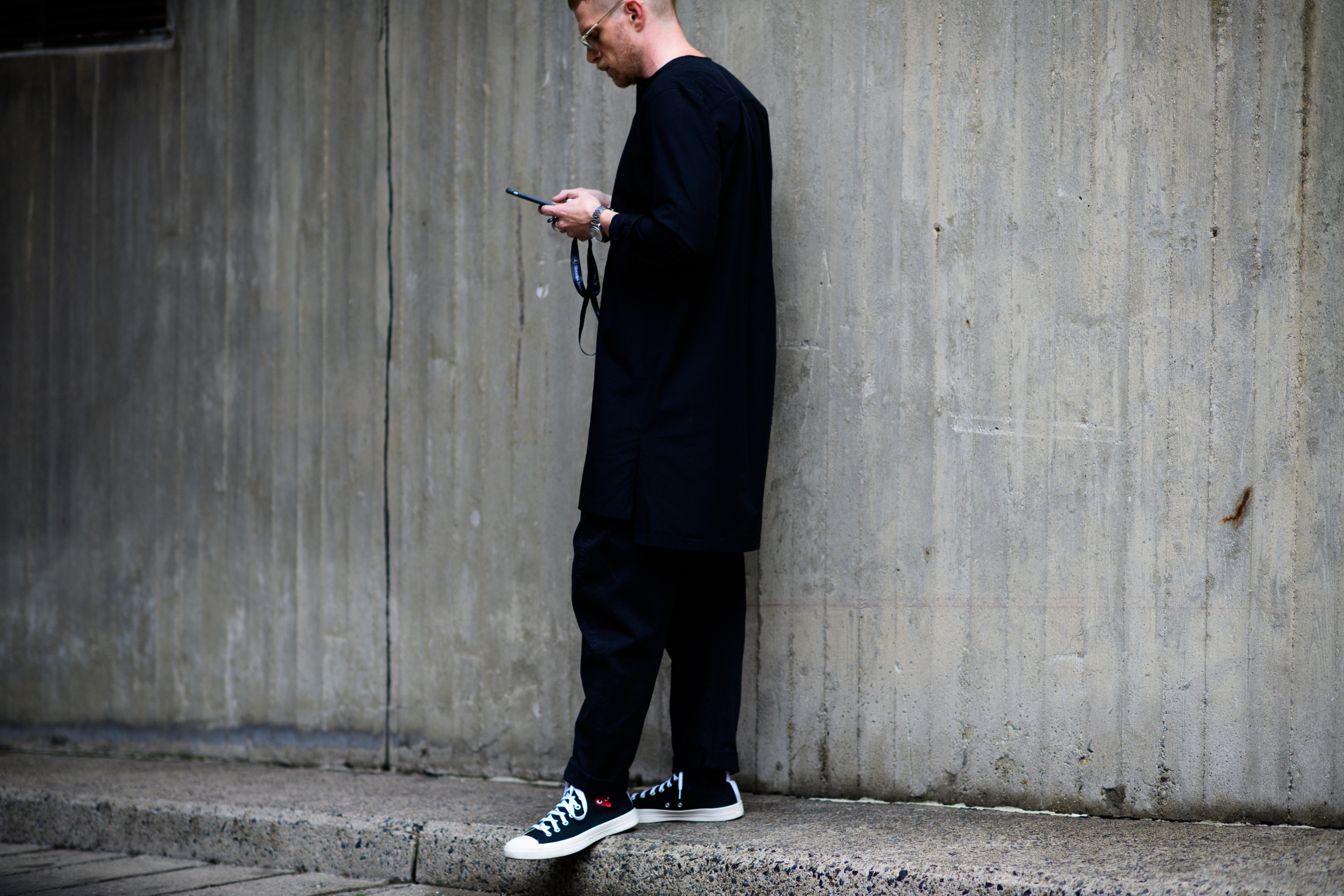 Man wearing all black outfit