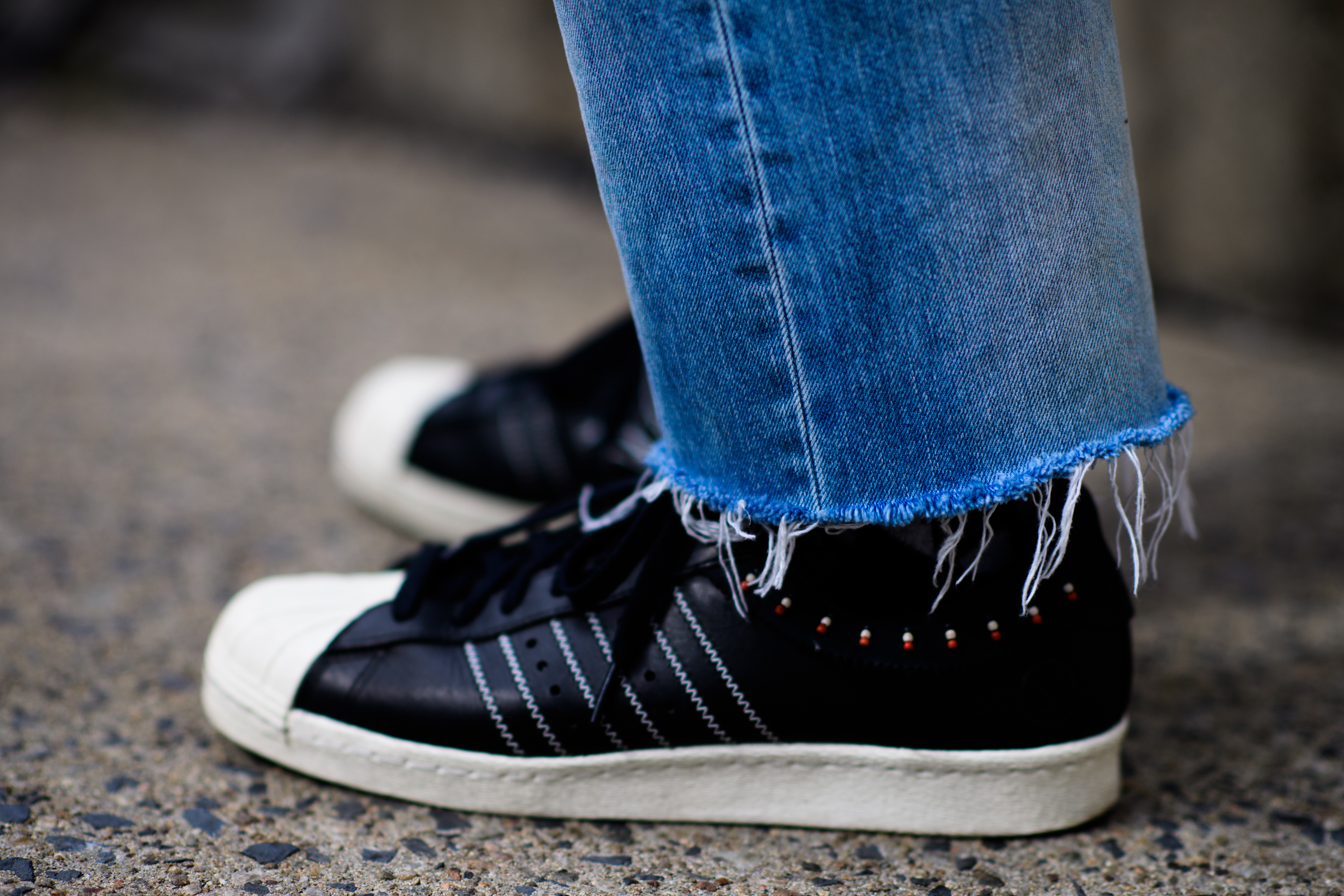 Adidas sneakers and cropped jeans