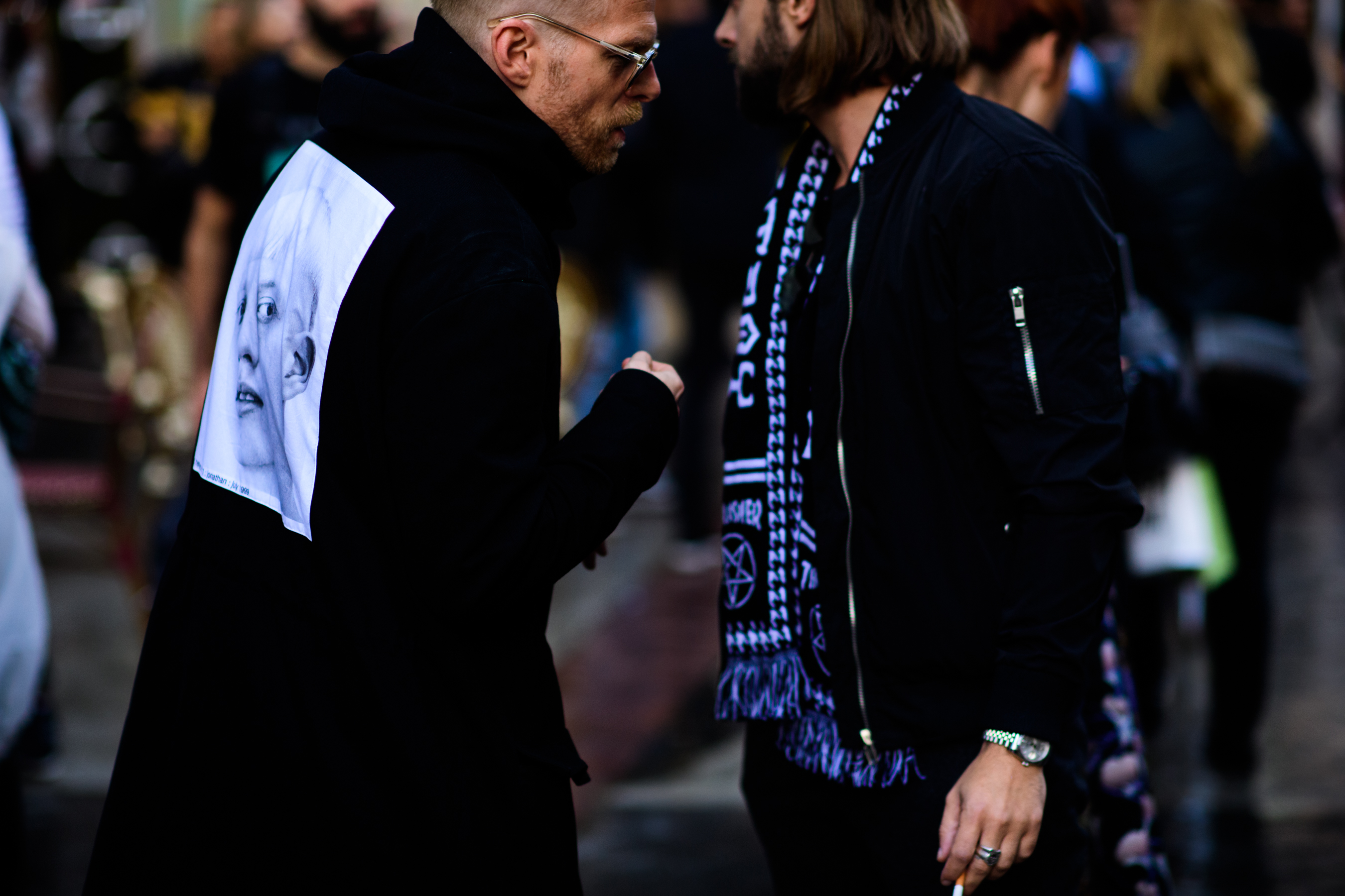Two men wearing all black
