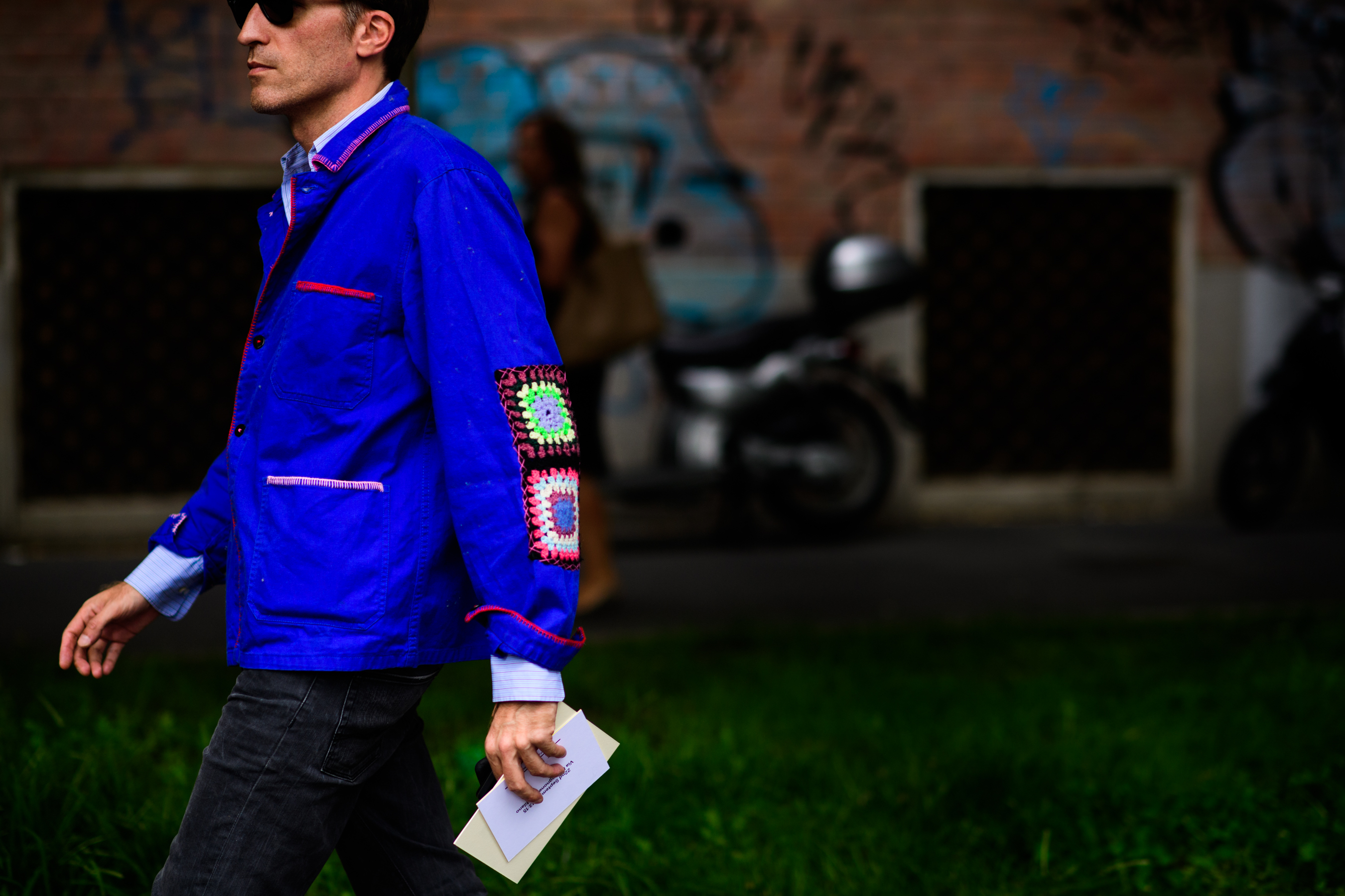 Man wearing blue jacket before Fendi