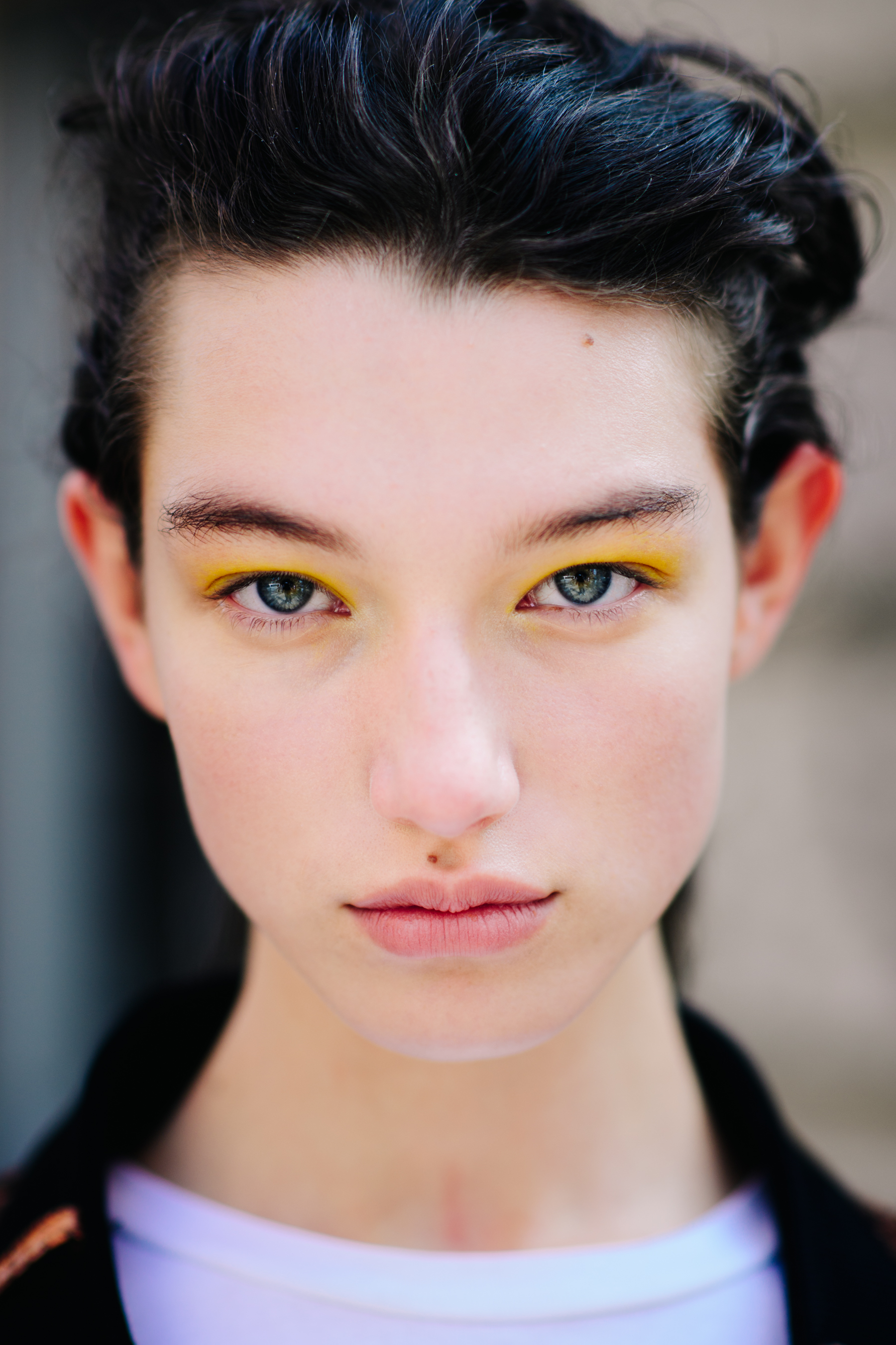 Portrait of a model with yellow make up