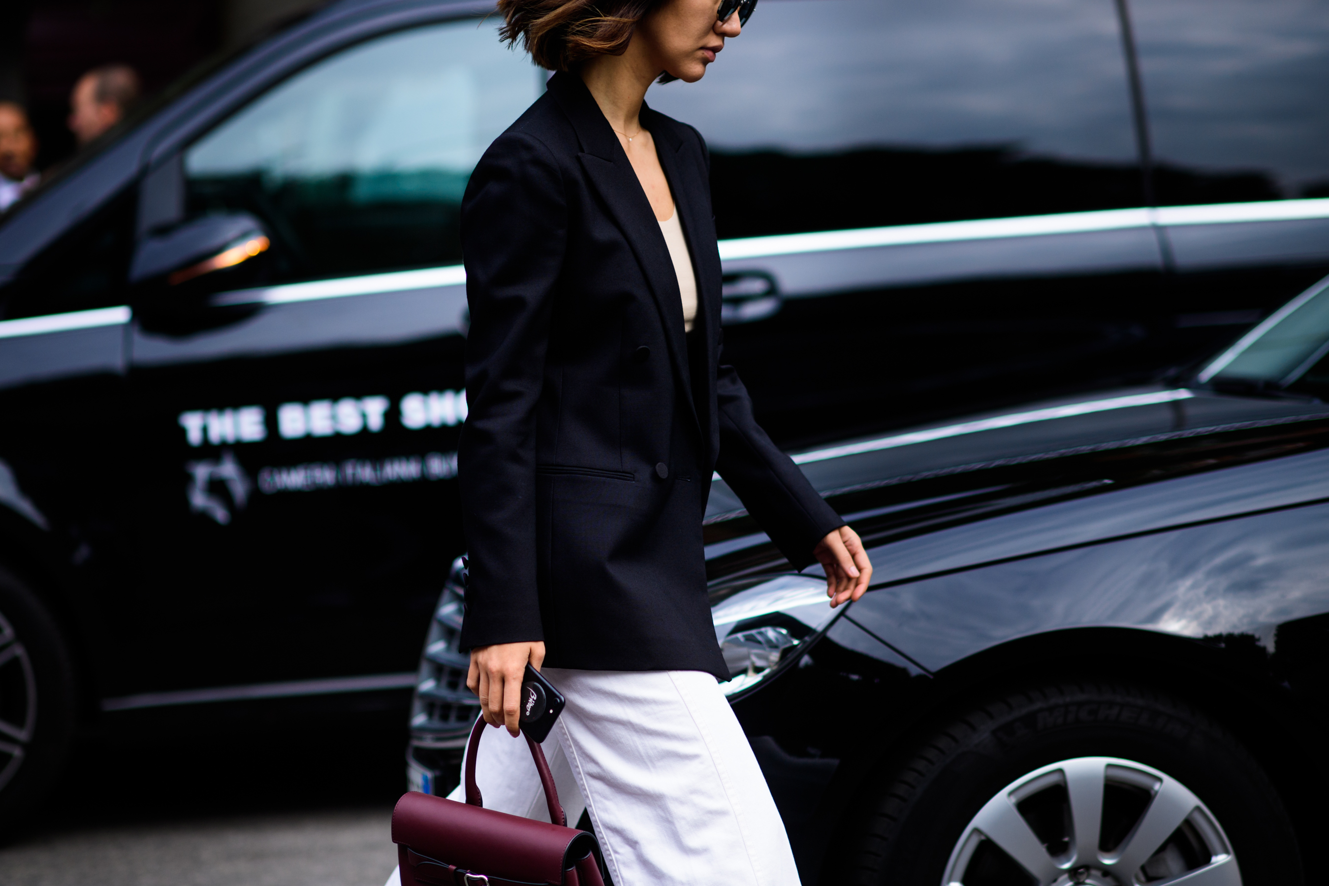 Kazakh woman wearing black blazer