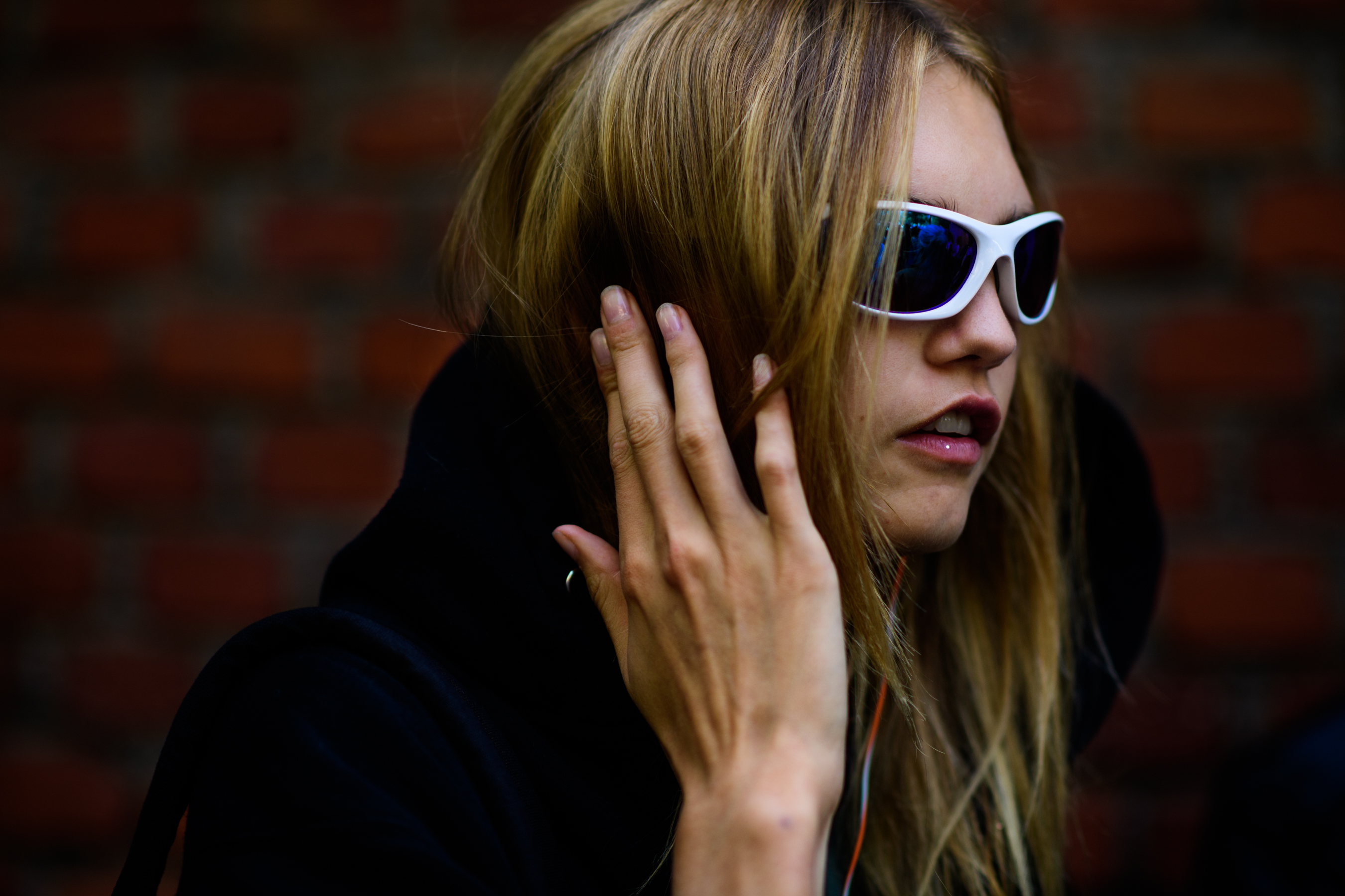 Model wearing white glasses after Fendi