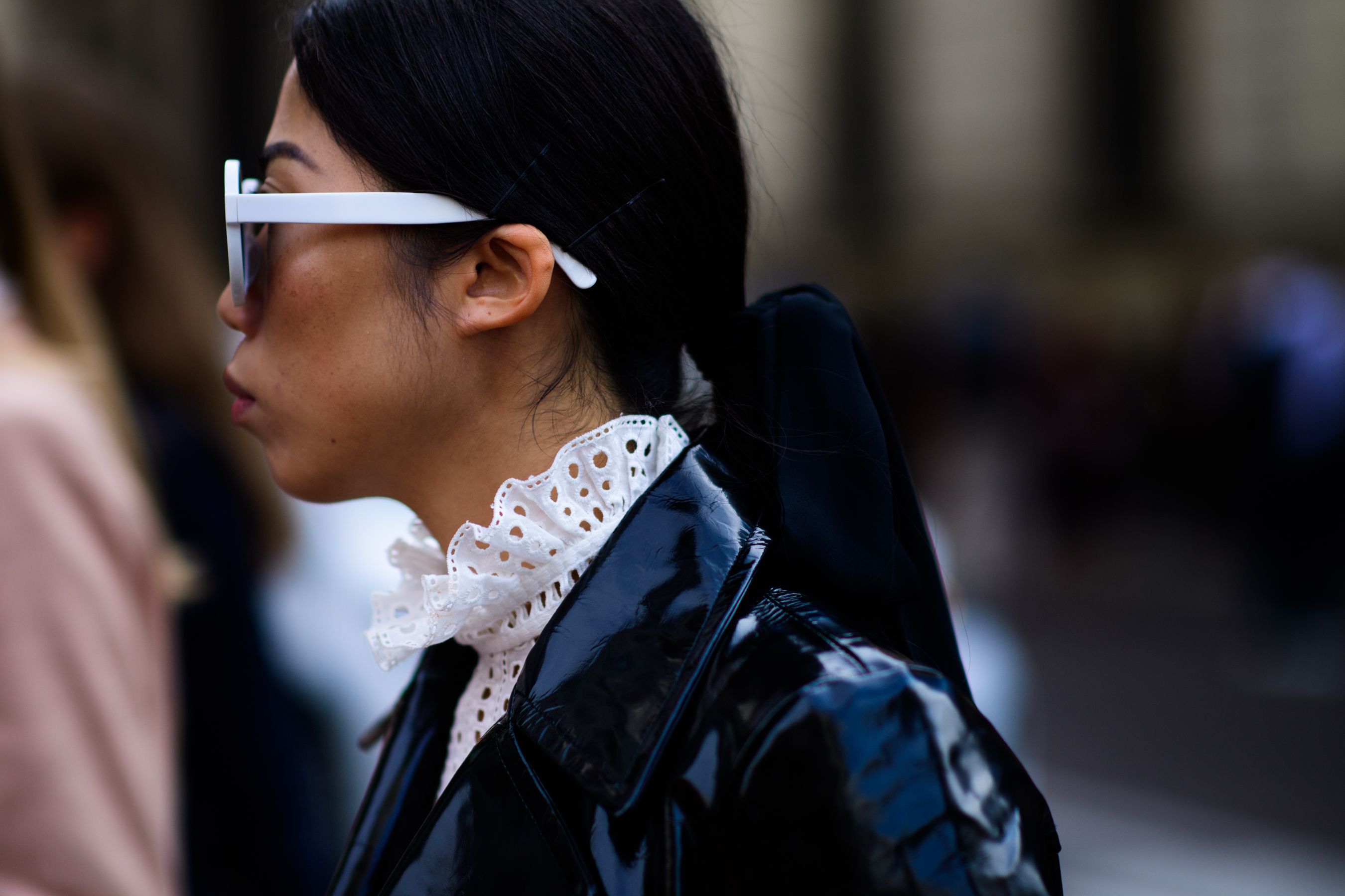 Russian stylist wearing white glasses