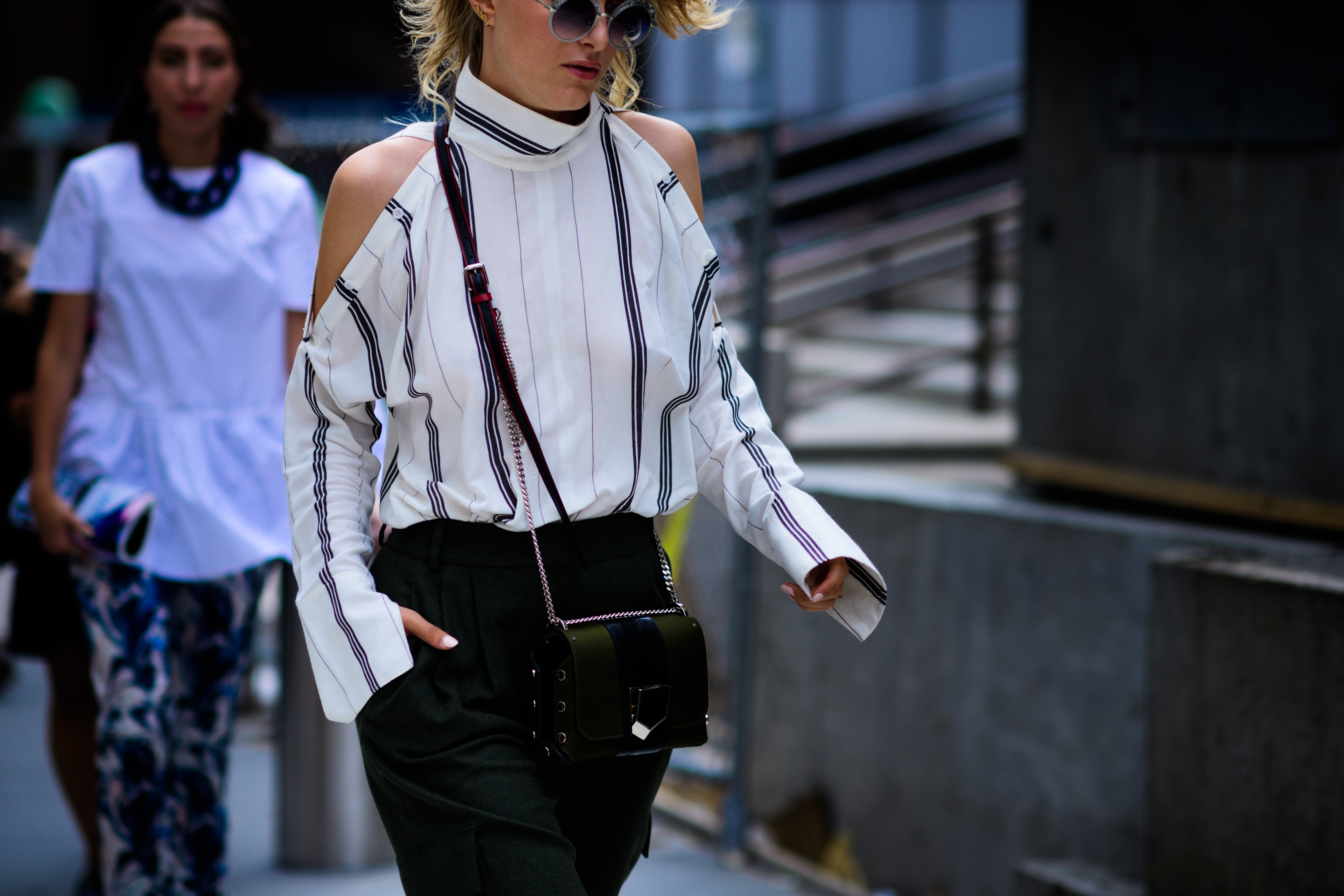 Woman wearing white shirt with stripes