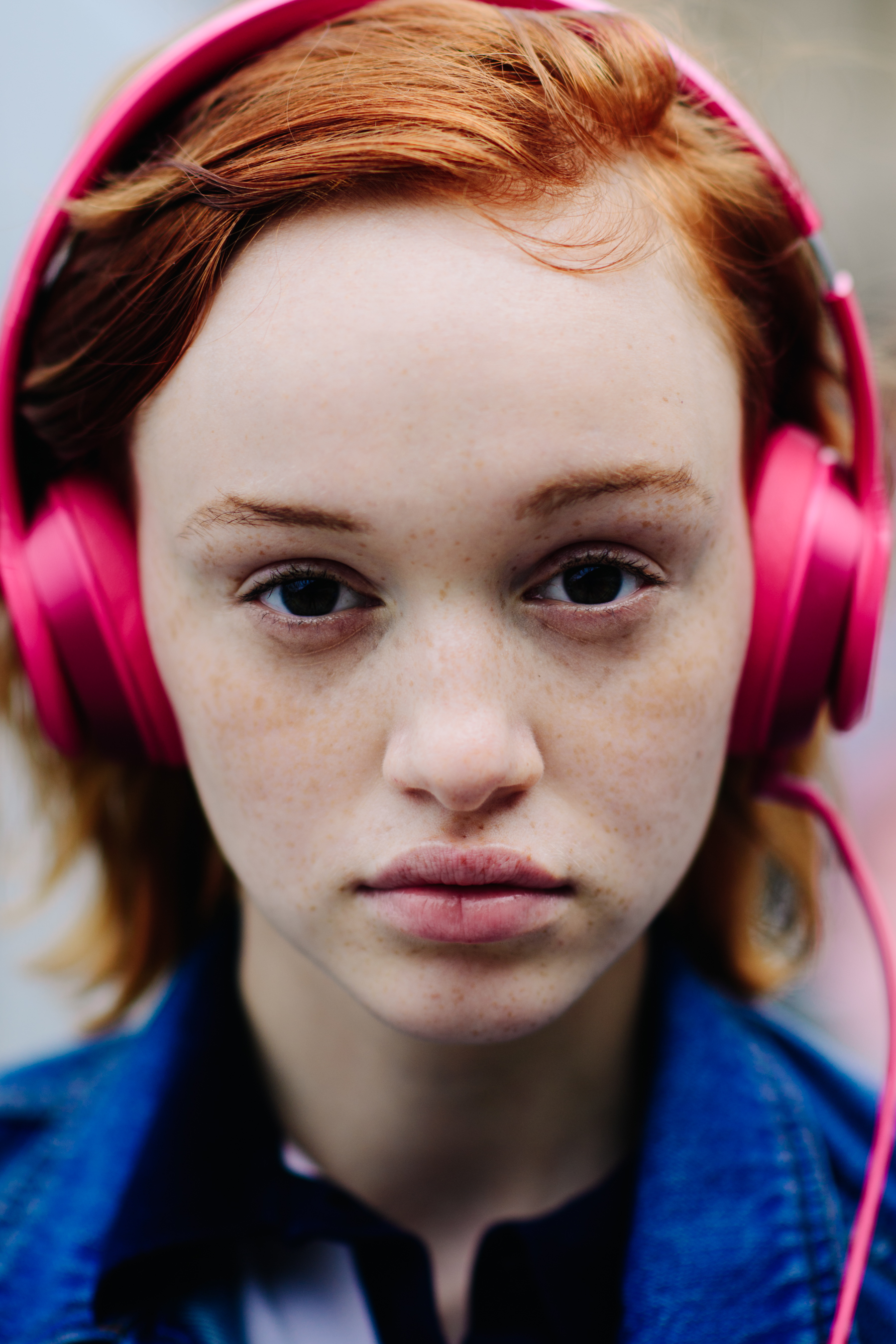 Portrait of a model with pink headphones