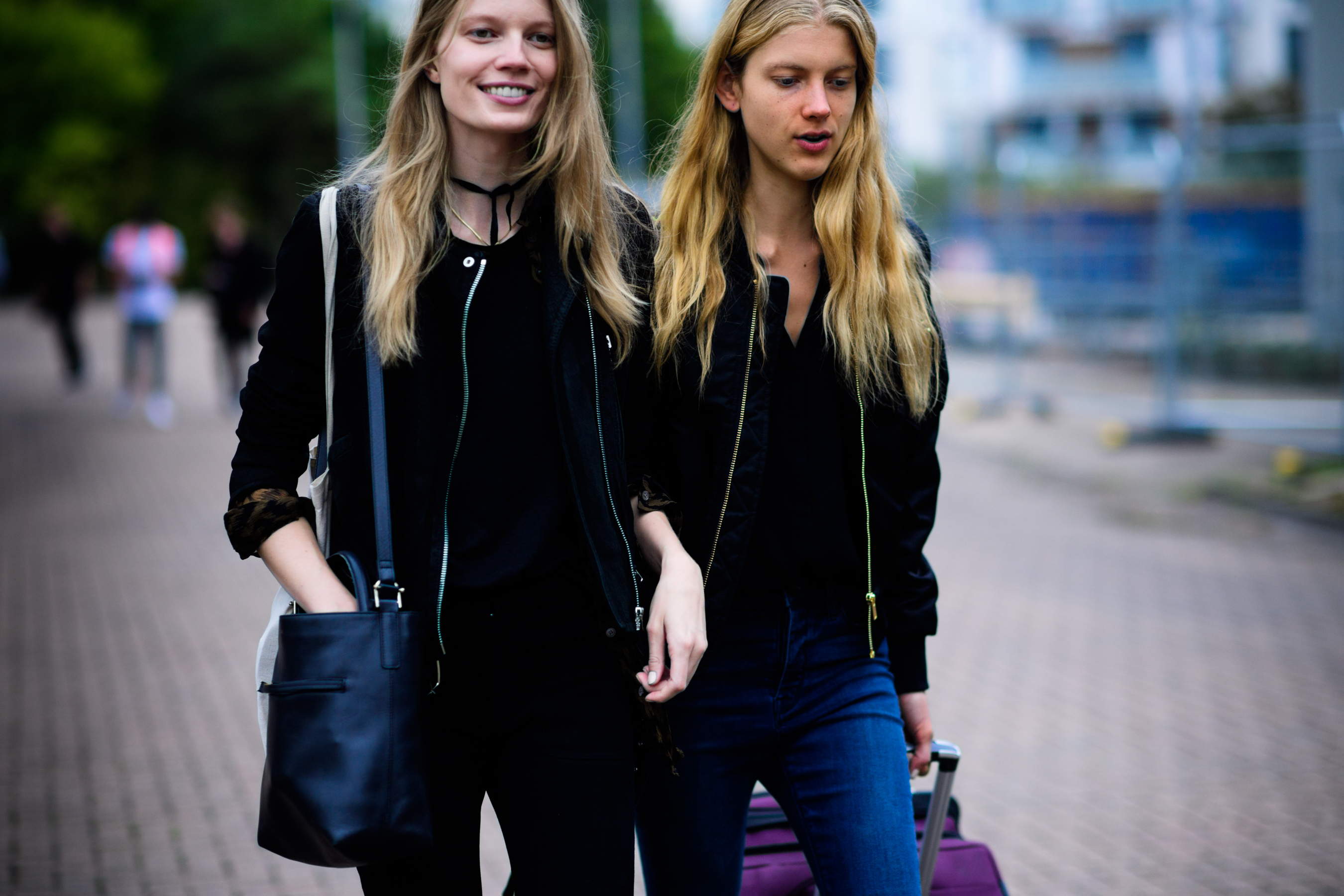 Two models with long blonde hair