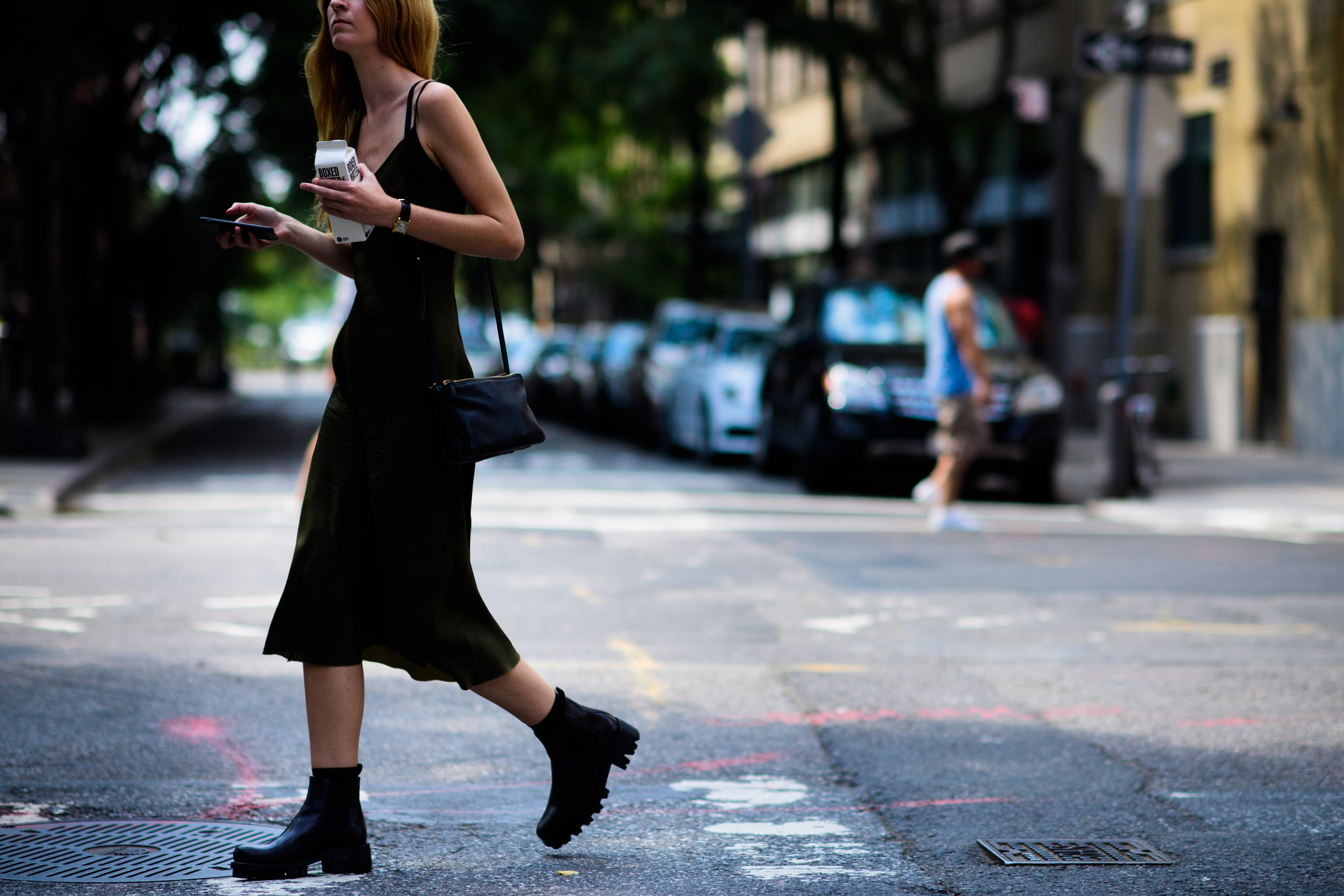 Woman wearing slip dress and boots