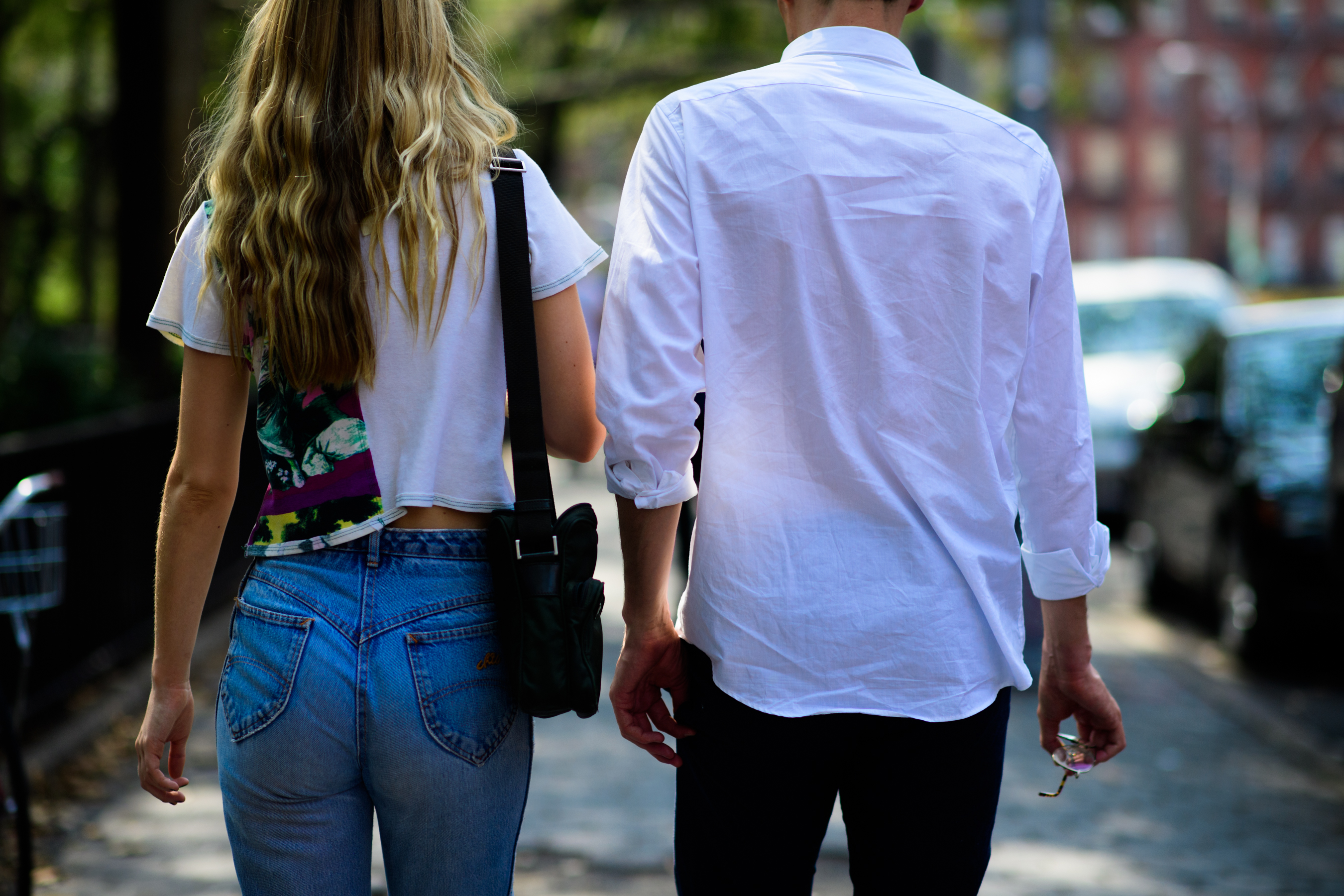 Woman and man wearing white shirts