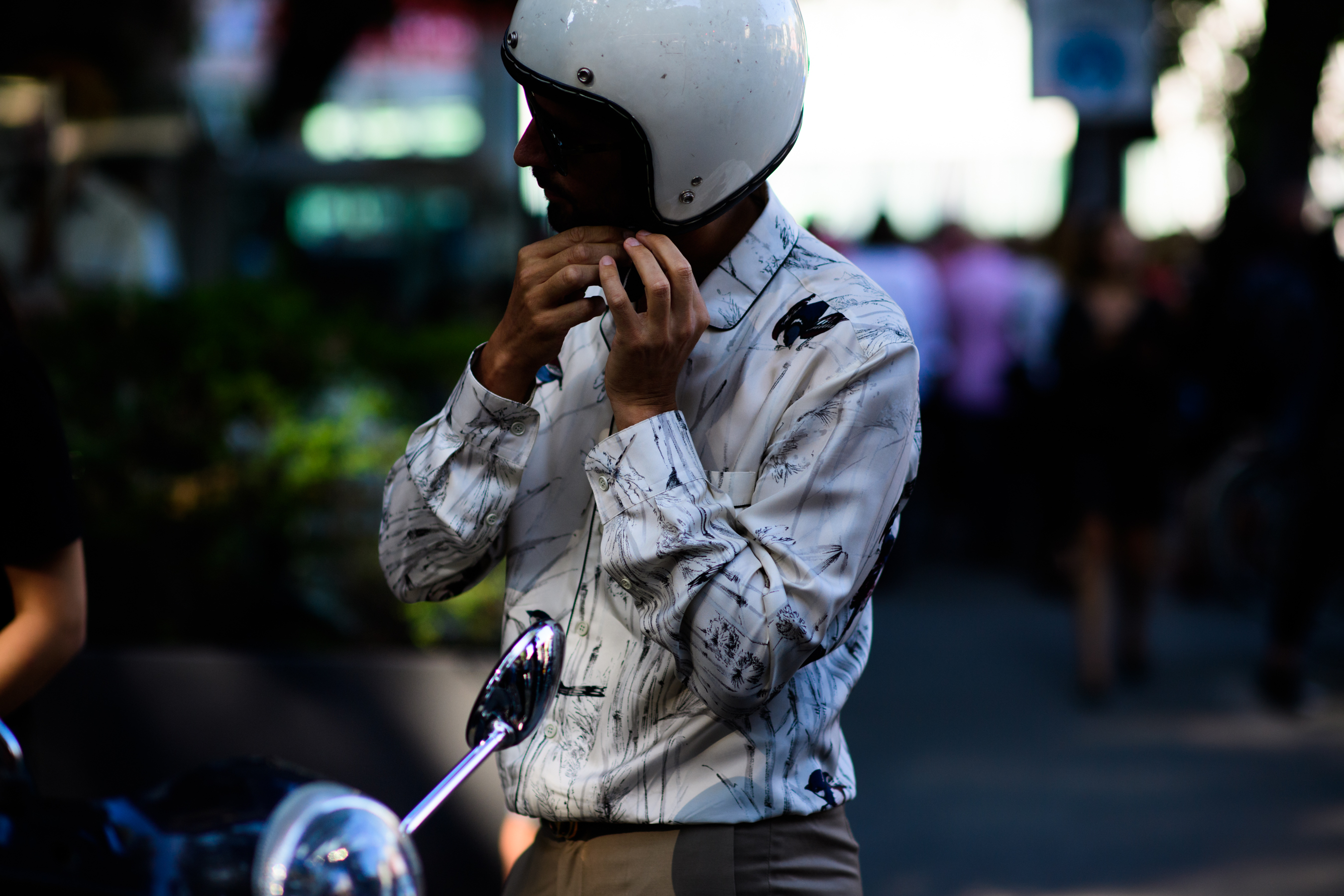 Italian journalist wearing white shirt