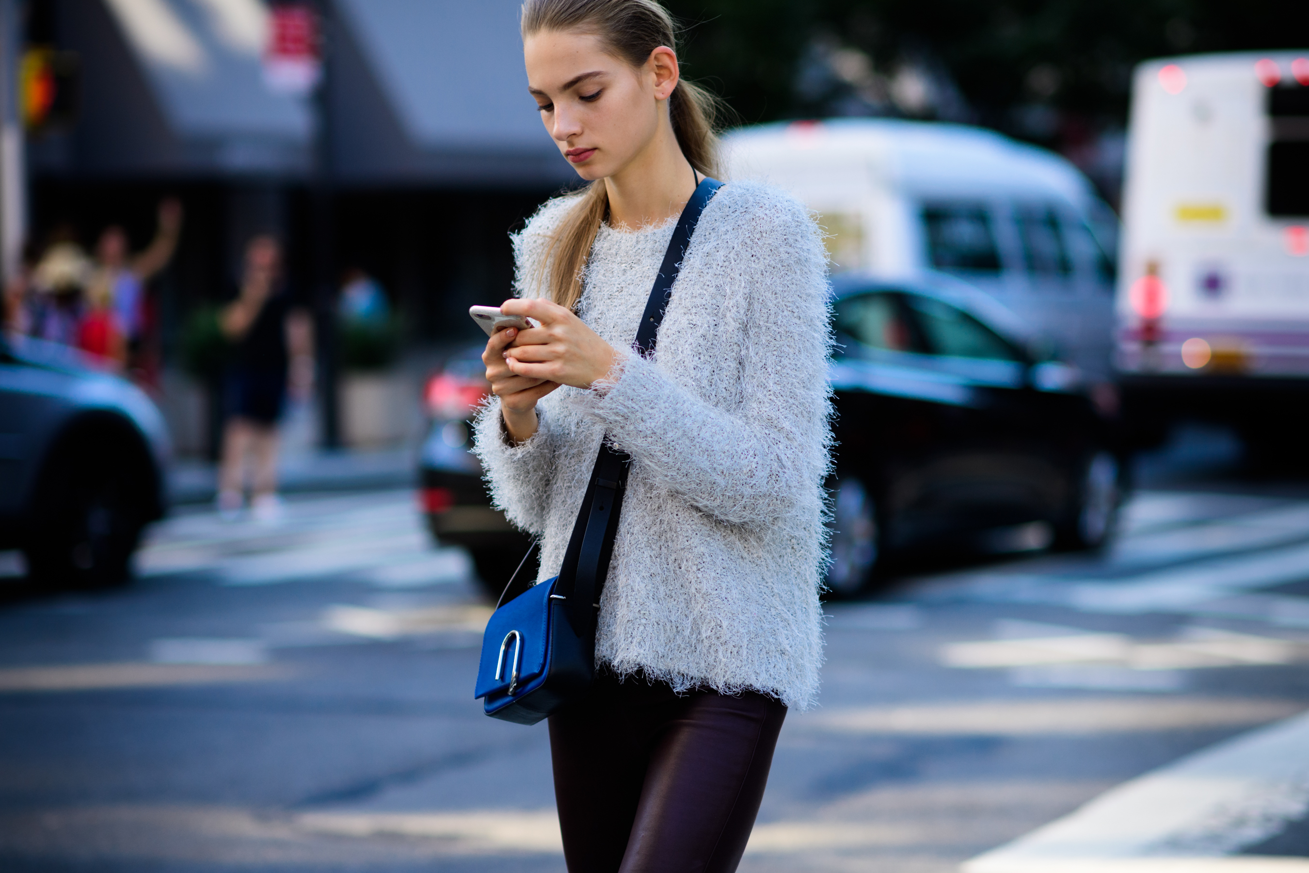 Model wearing sweater after the show