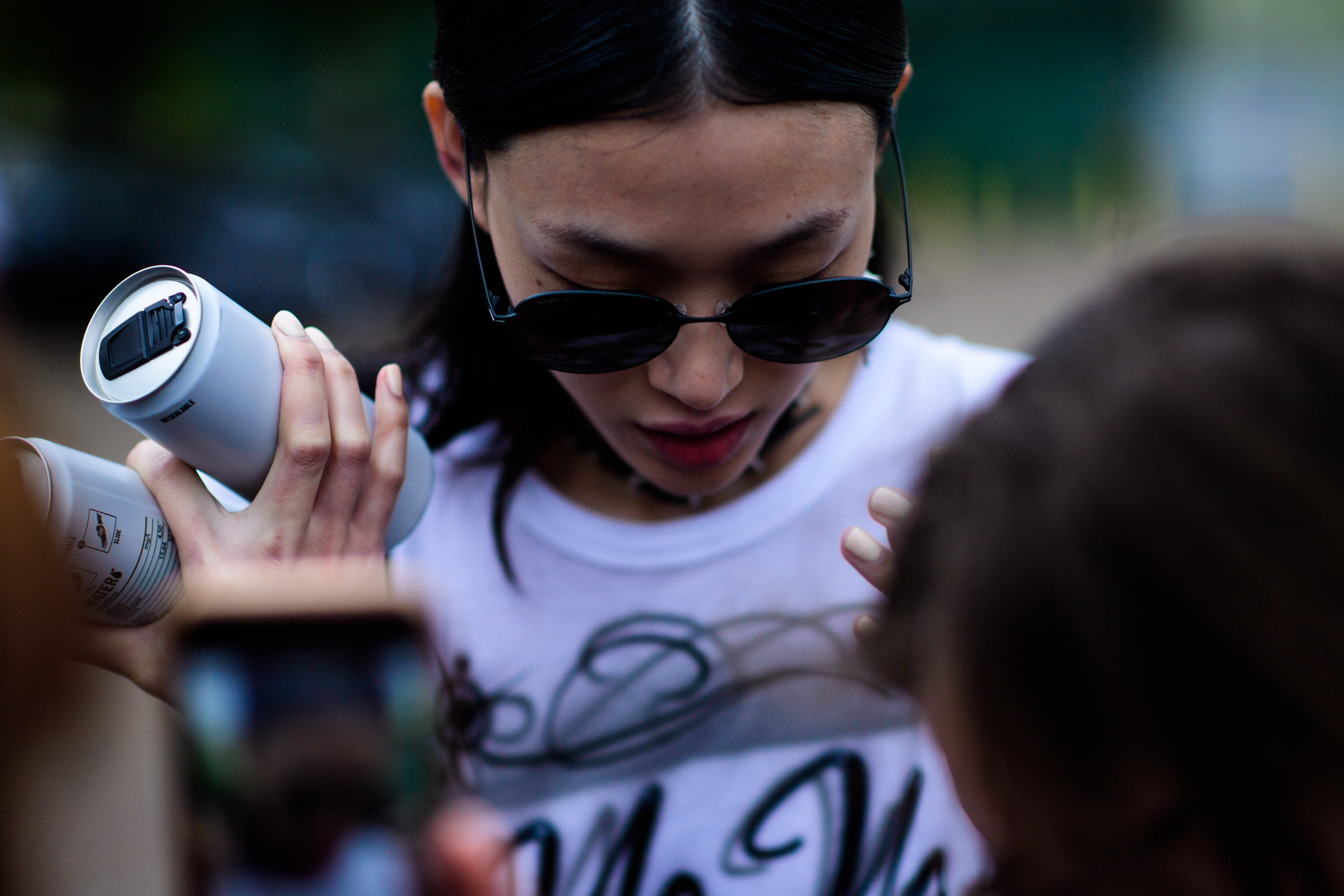 Korean model wearing dark glasses