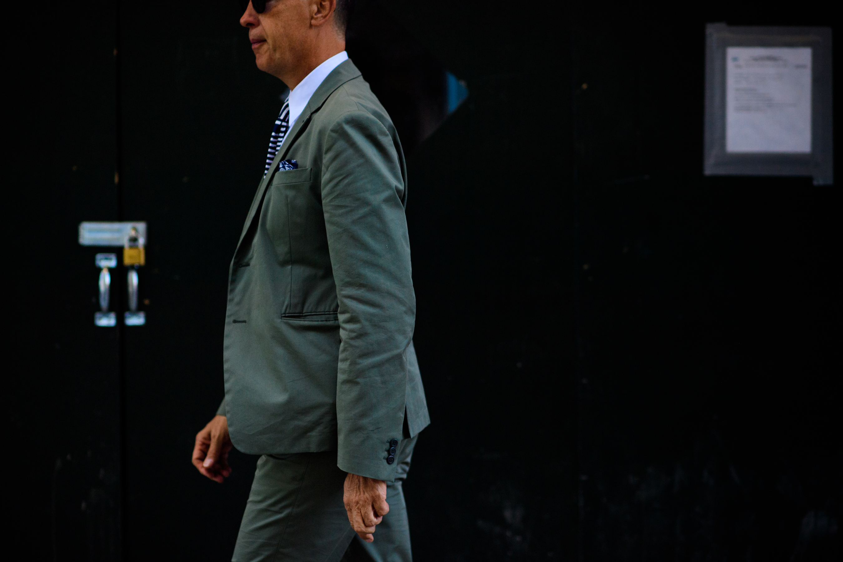 Man wears light green suit