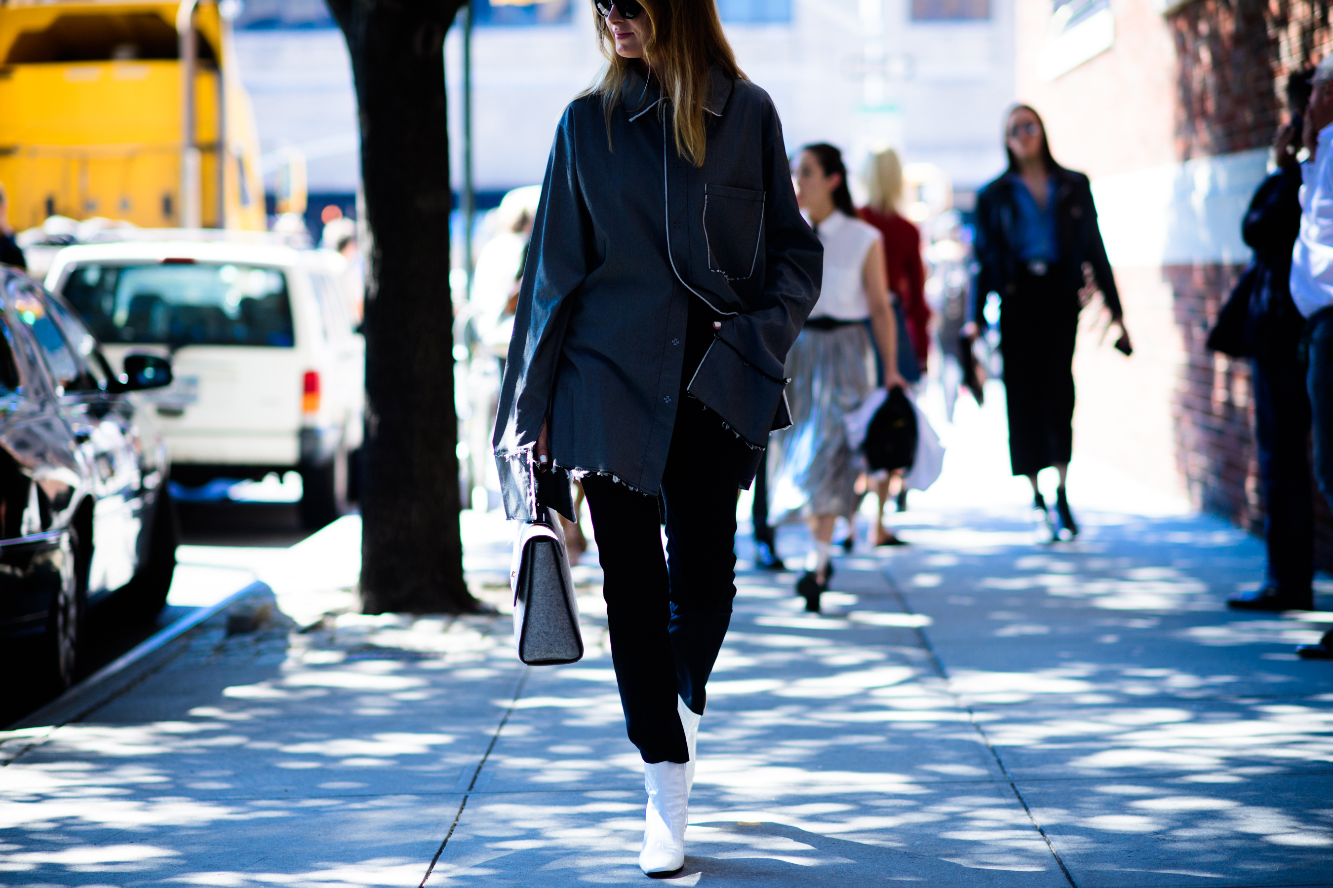 Woman wearing grey oversized shirt