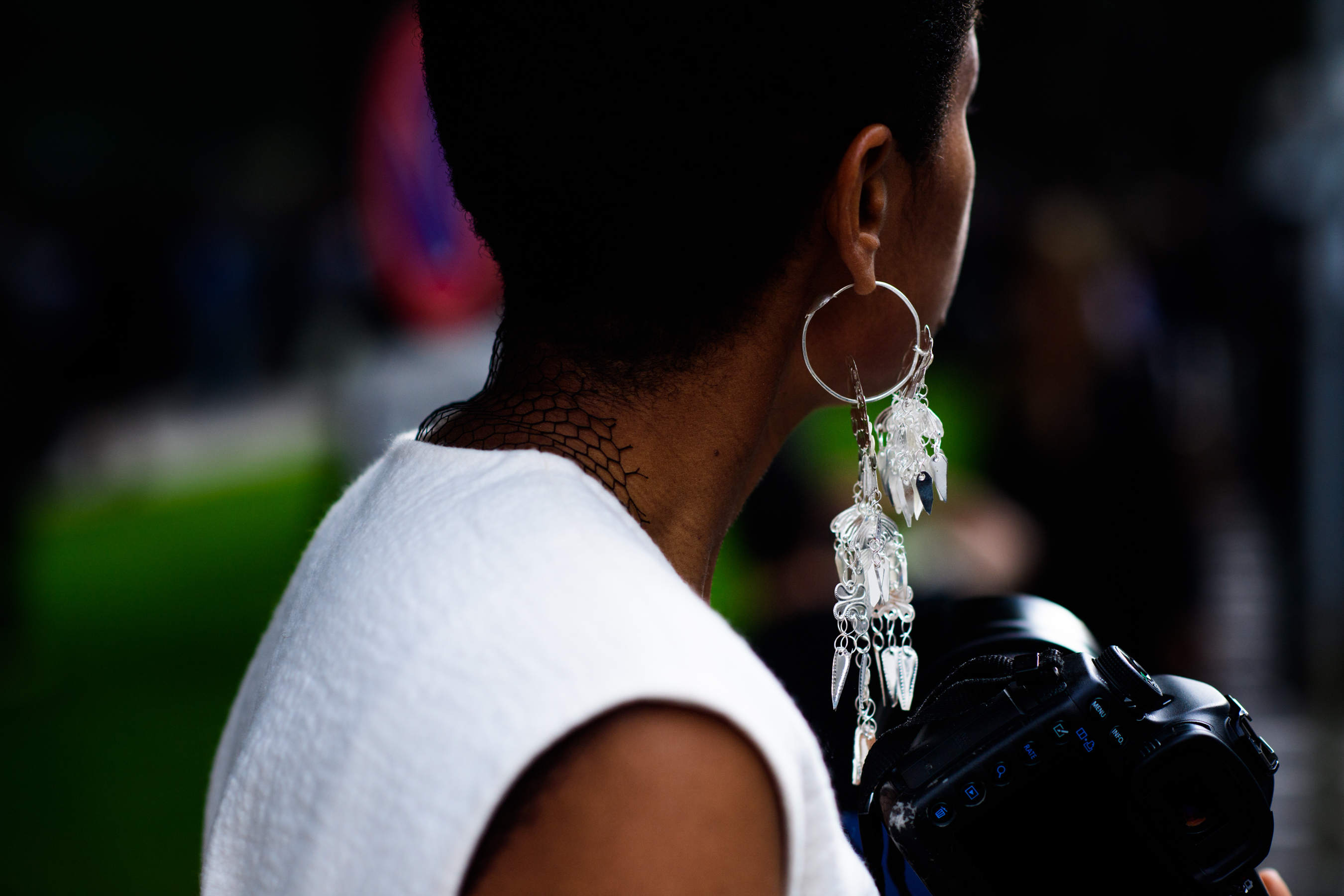 Photographer and blogger with mono earring