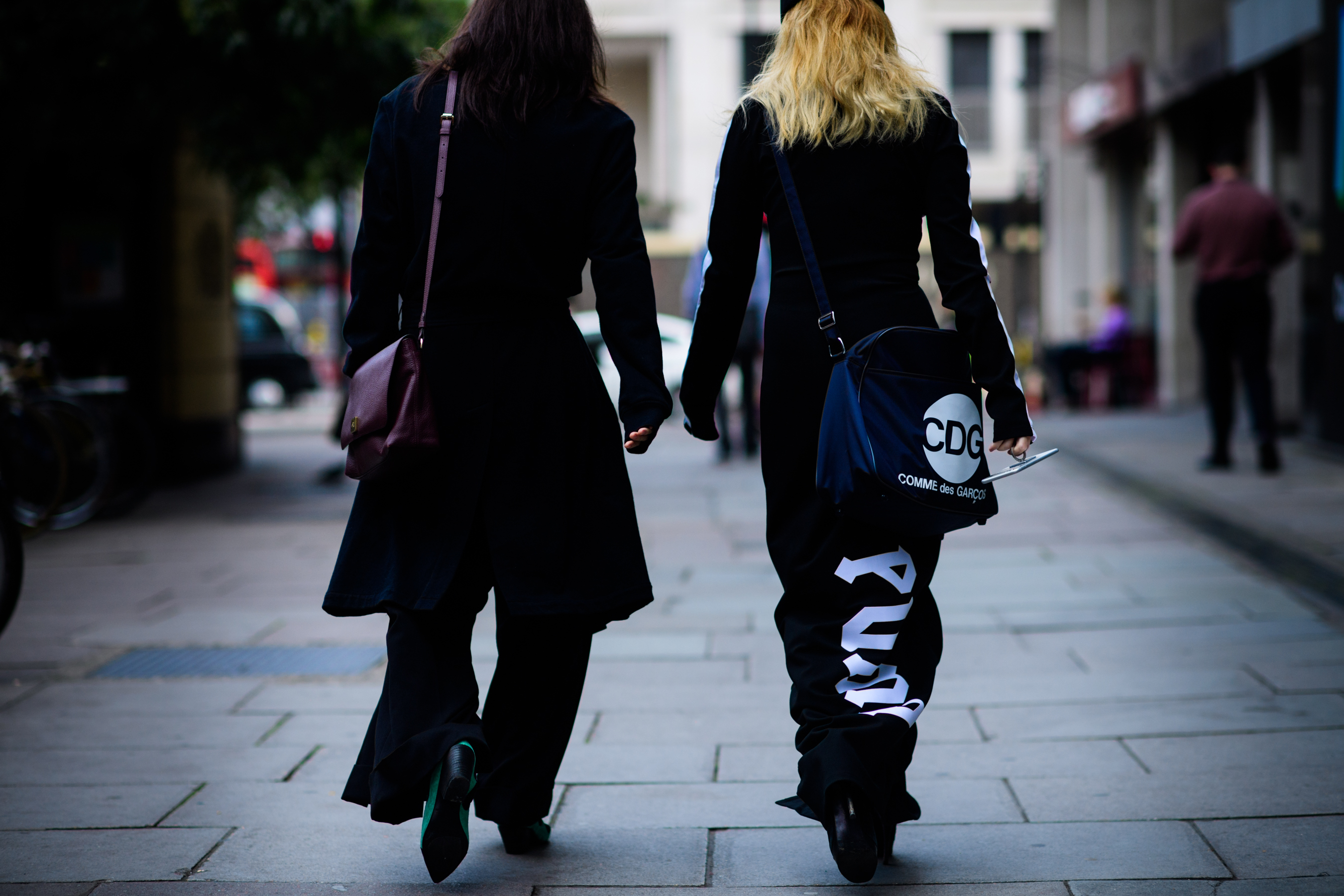 Two woman in all black