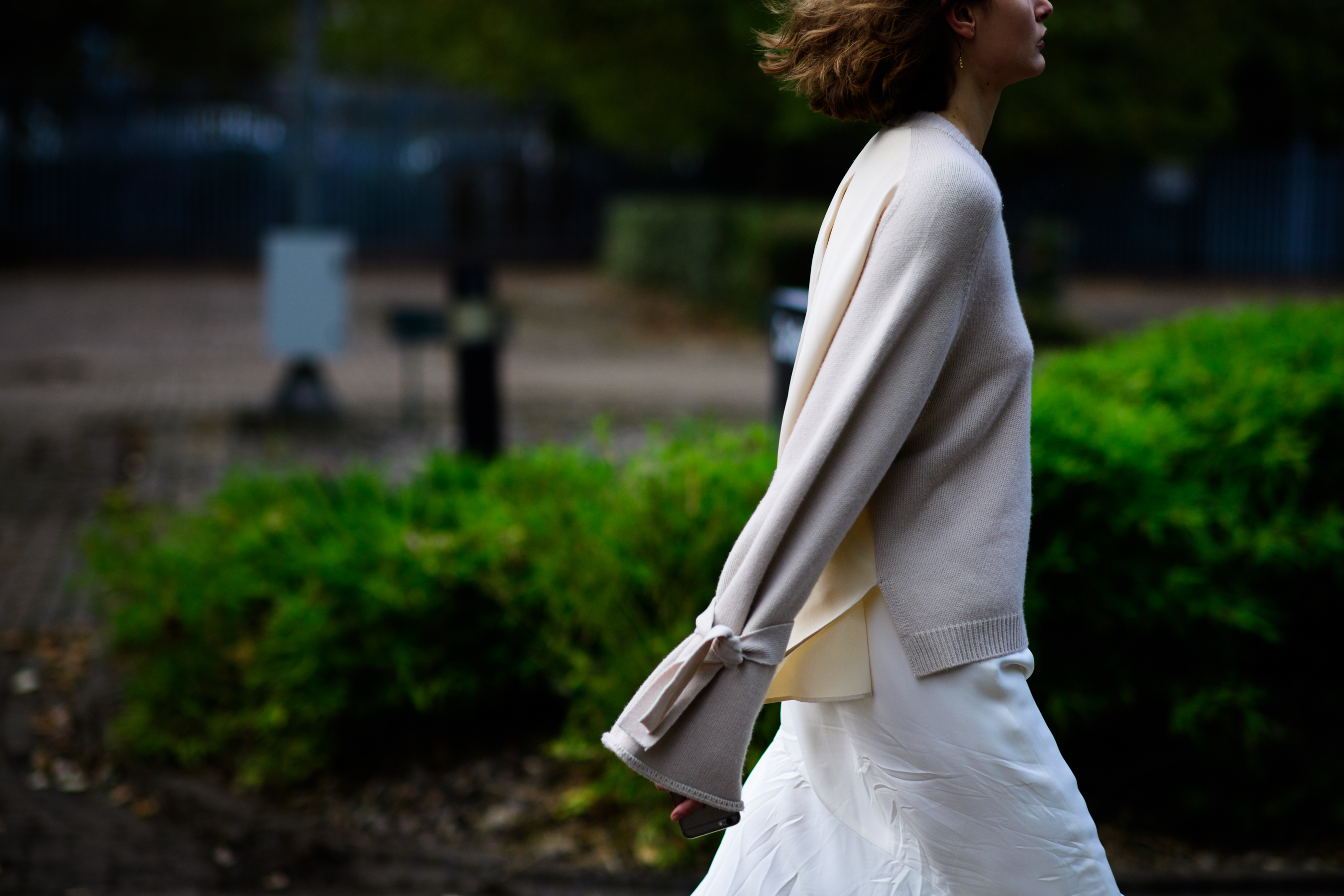 Woman wearing beige sweater