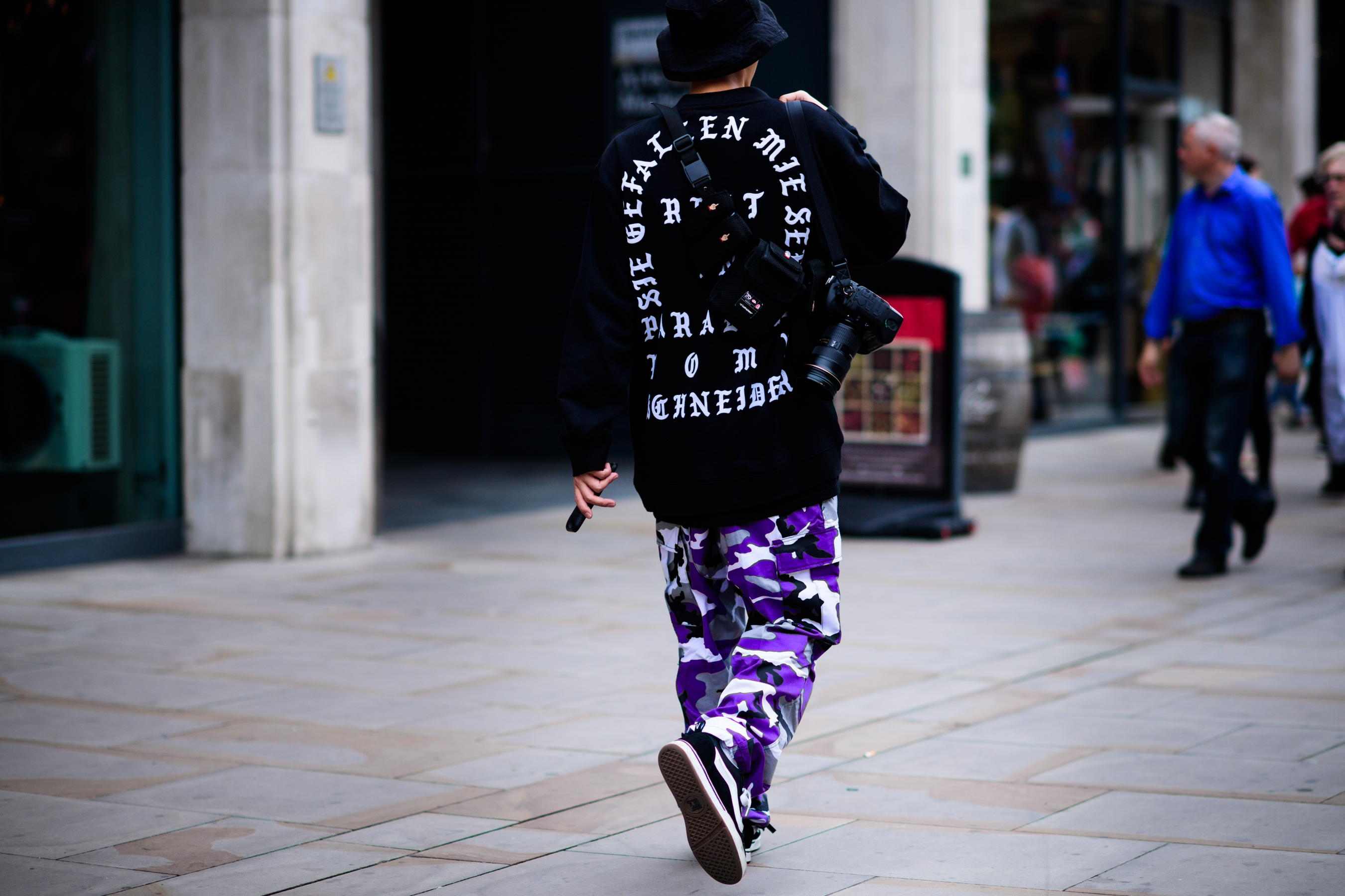 Korean photographer wearing camo pants