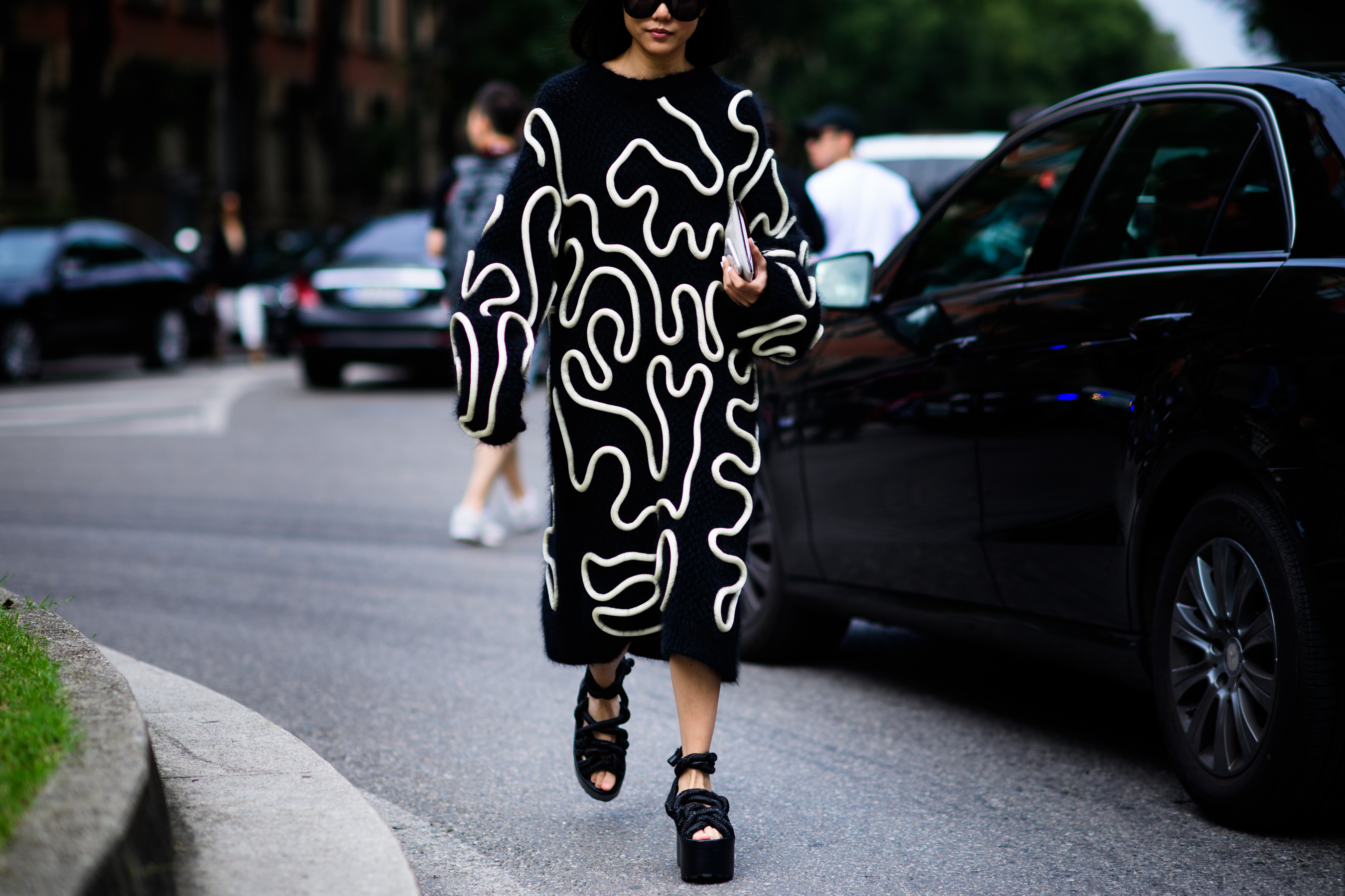 Singaporean presenter wearing graphic dress