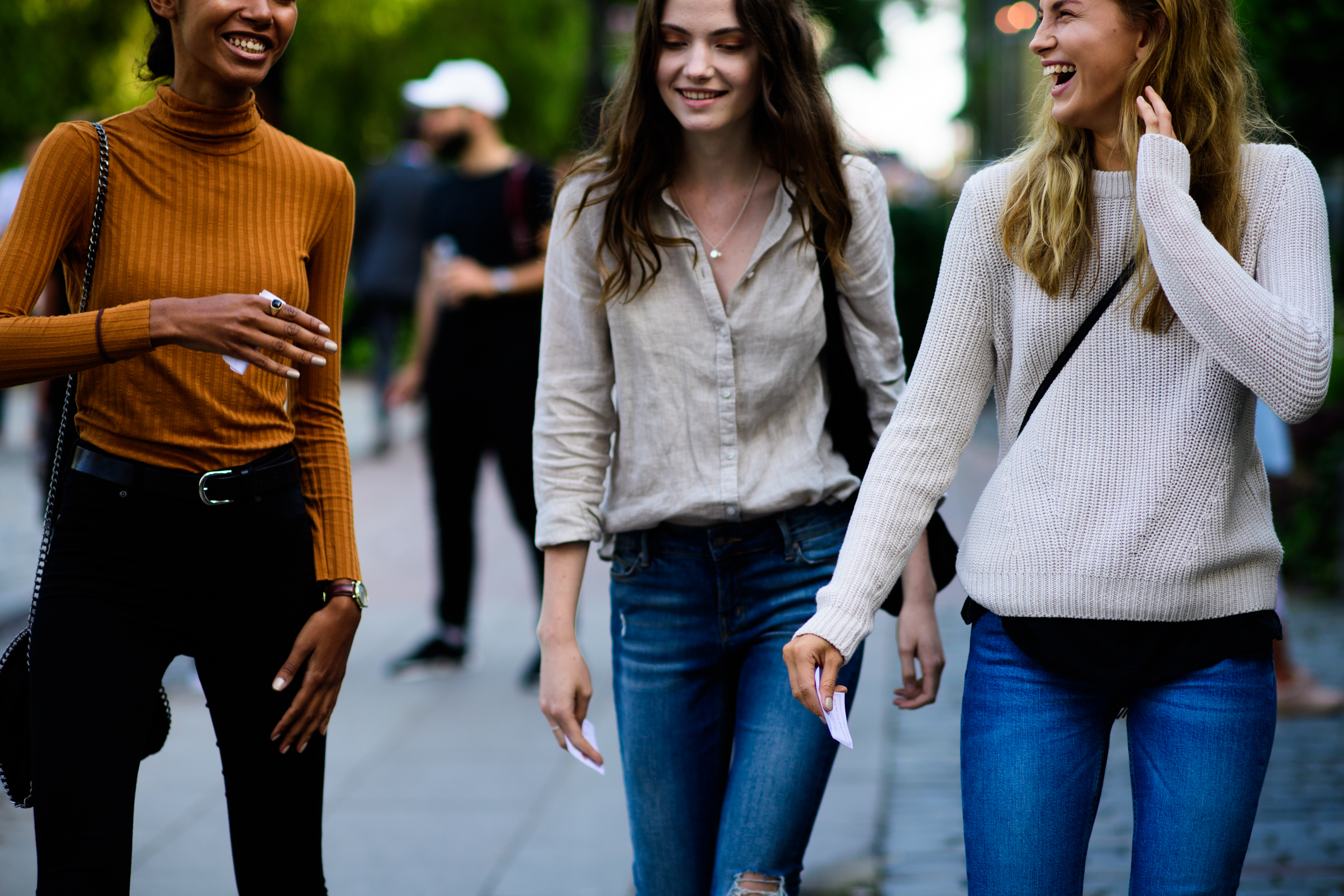 Three woman wearing denim