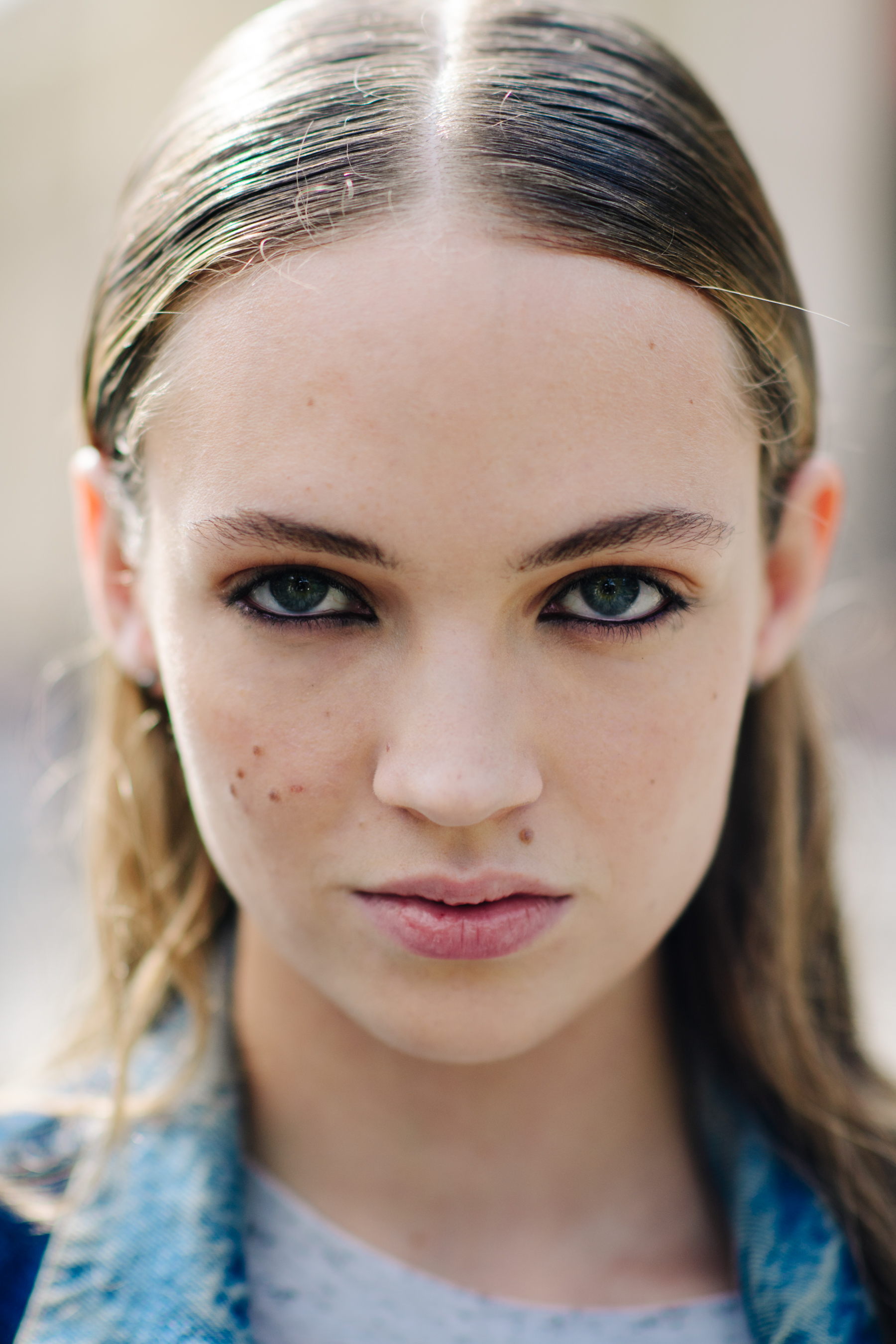 Portrait of German model with blonder hair and blue eyes