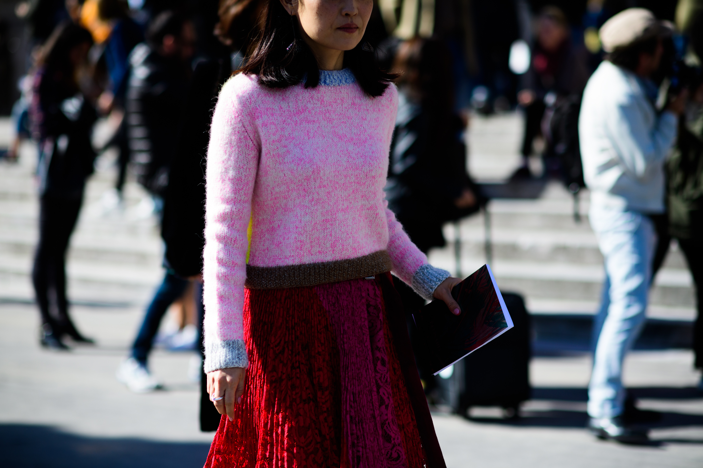 Woman wearing pink knit sweater