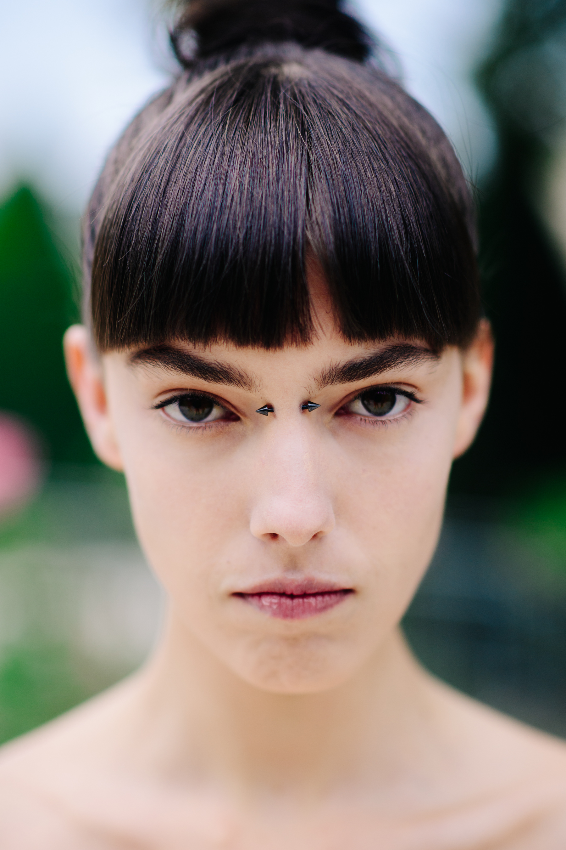 Portrait of a model with facial piercing