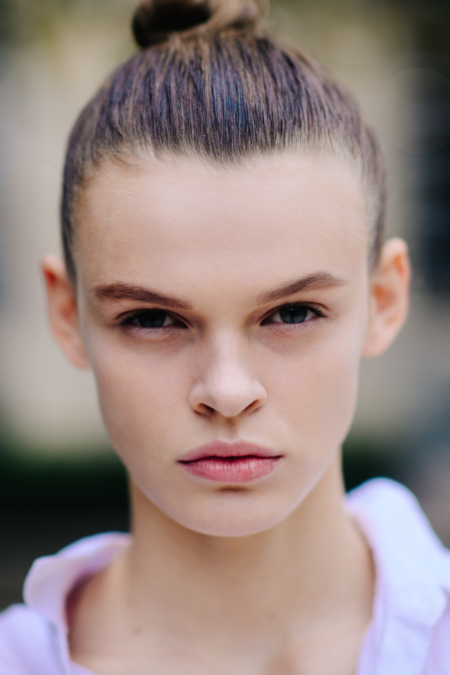 Portrait of model with blue eyes and brown hair