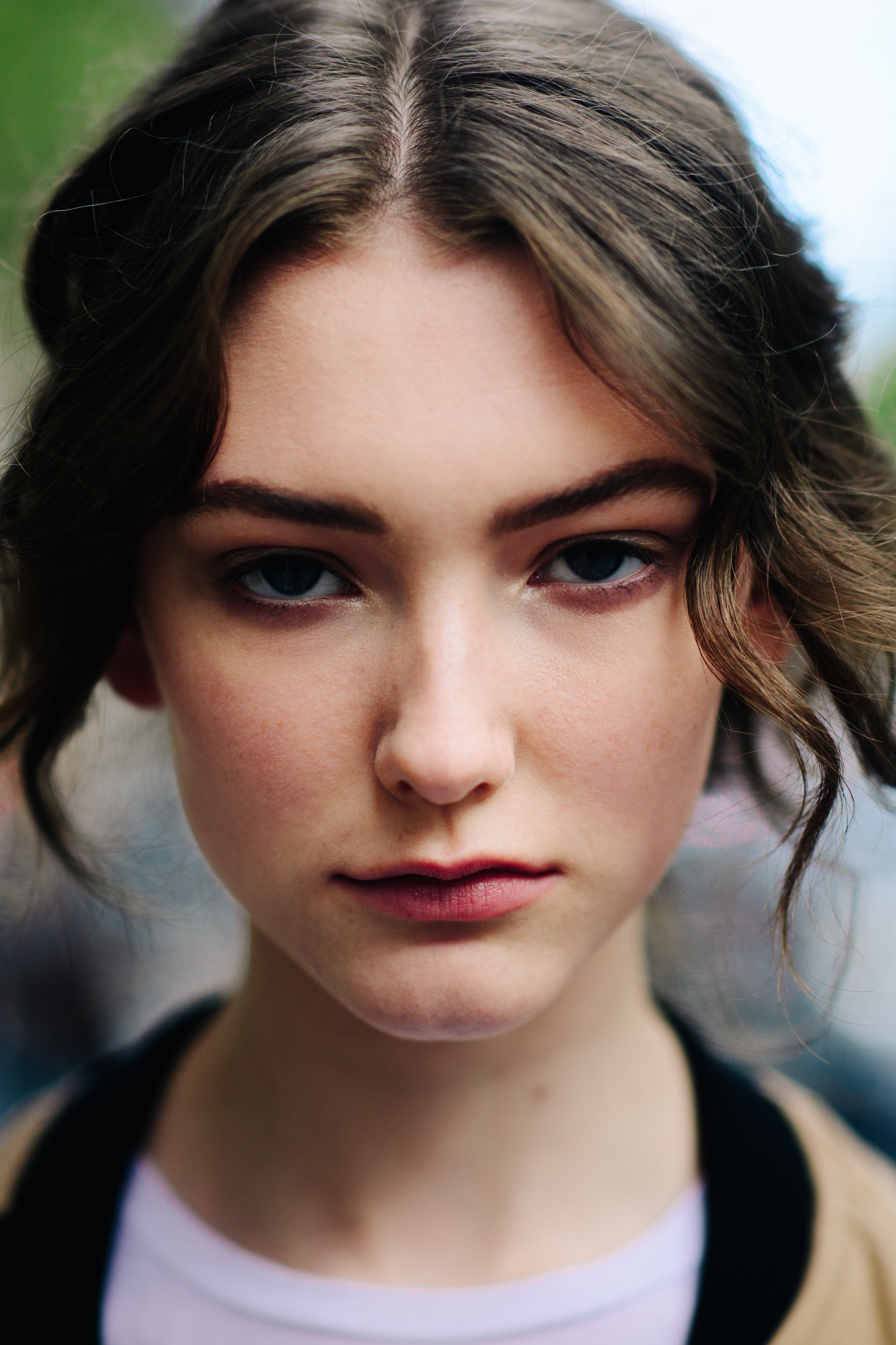 Portrait of American model with brown parted hair