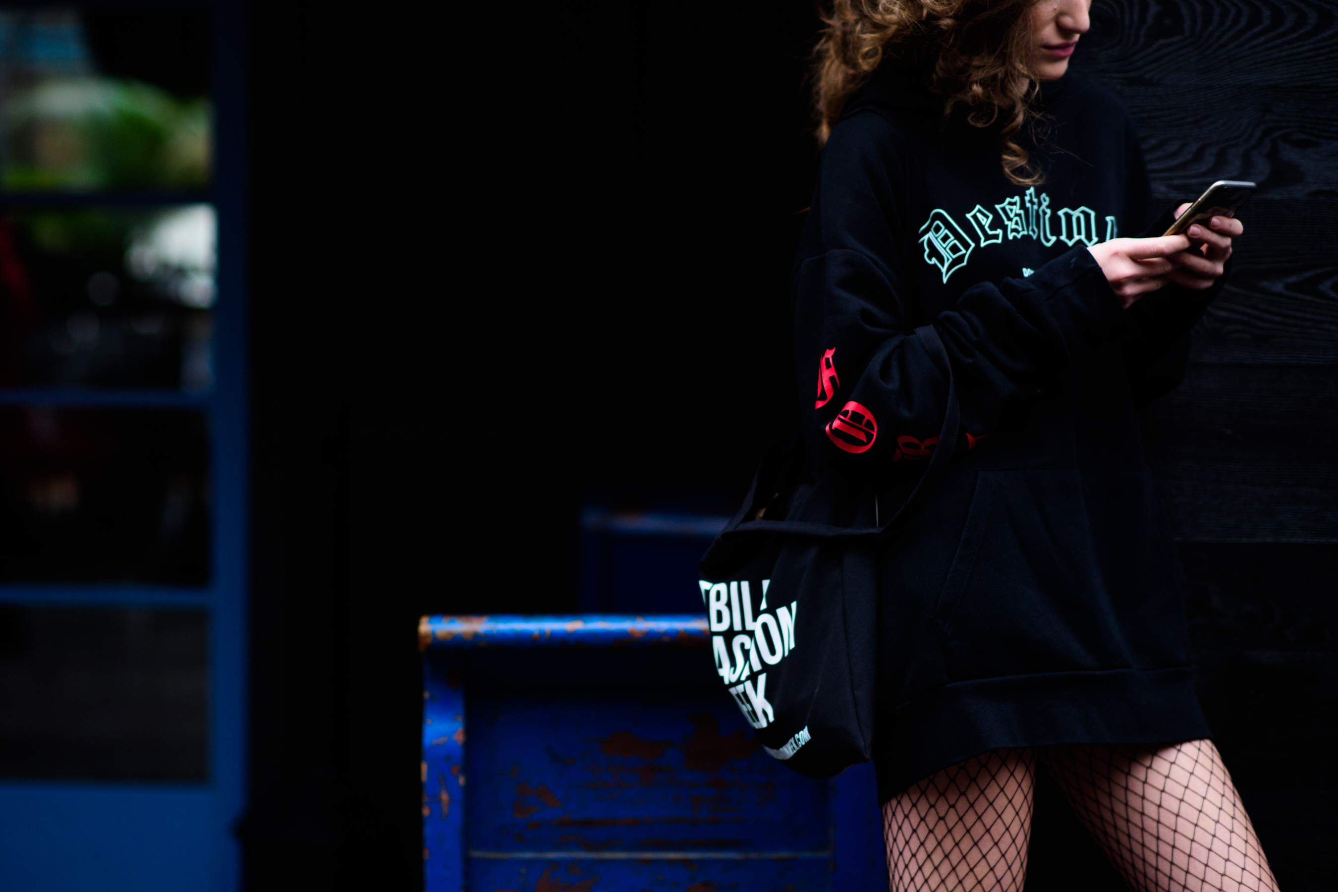 Model wearing black hoodie