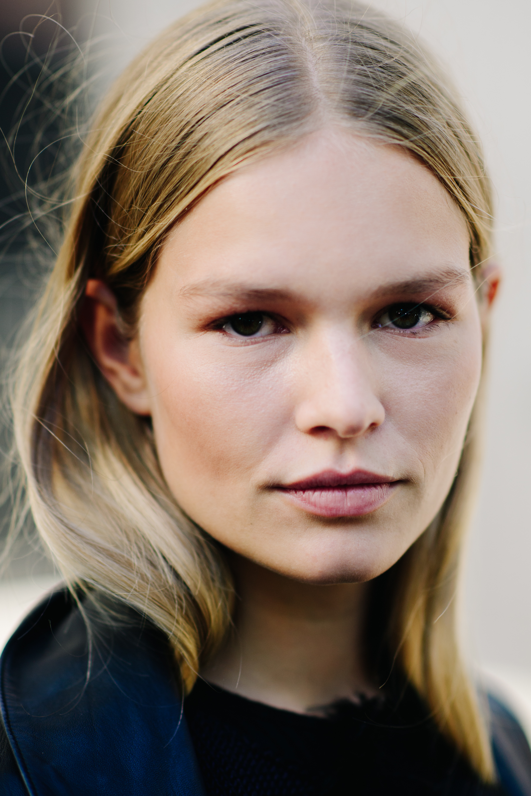 Portrait of model with blonde hair and green eyes