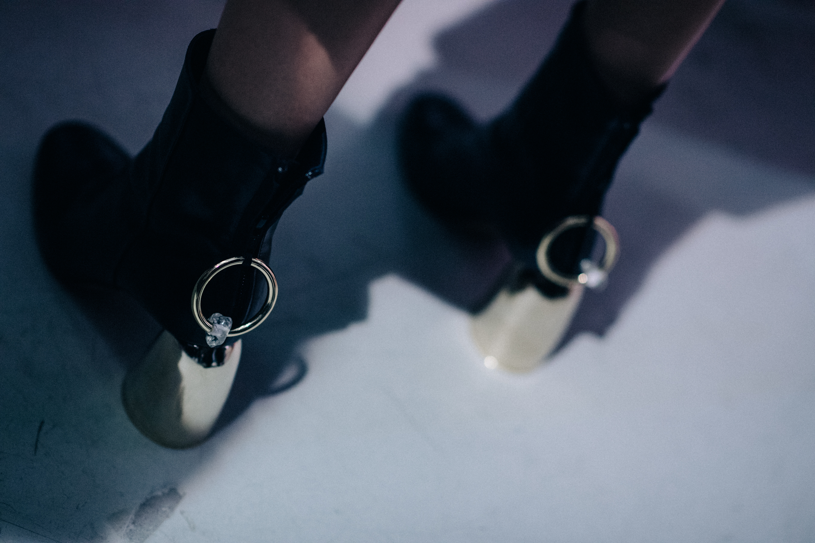 Shoes with metal ring detail