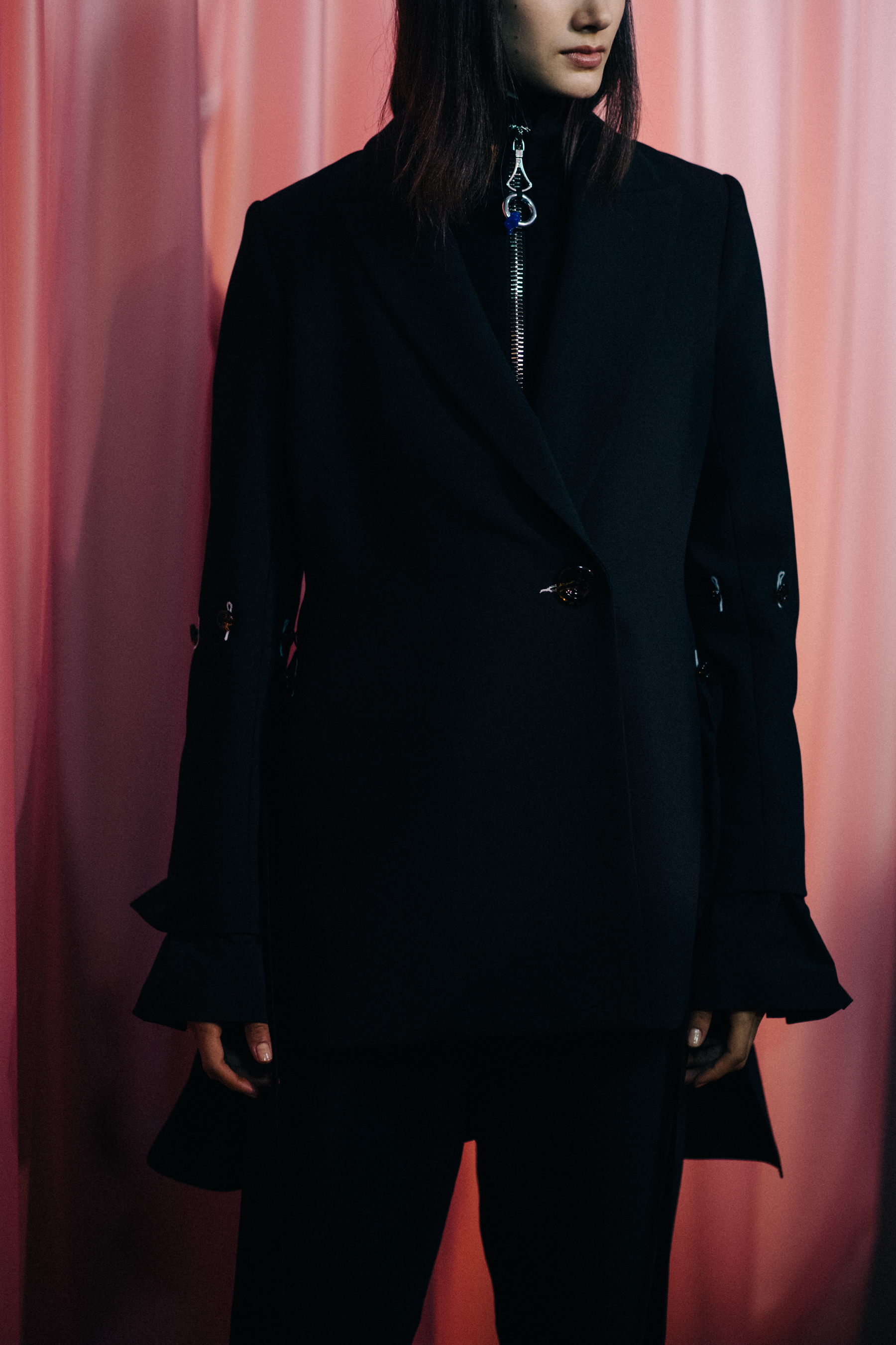 Model wearing all black outfit