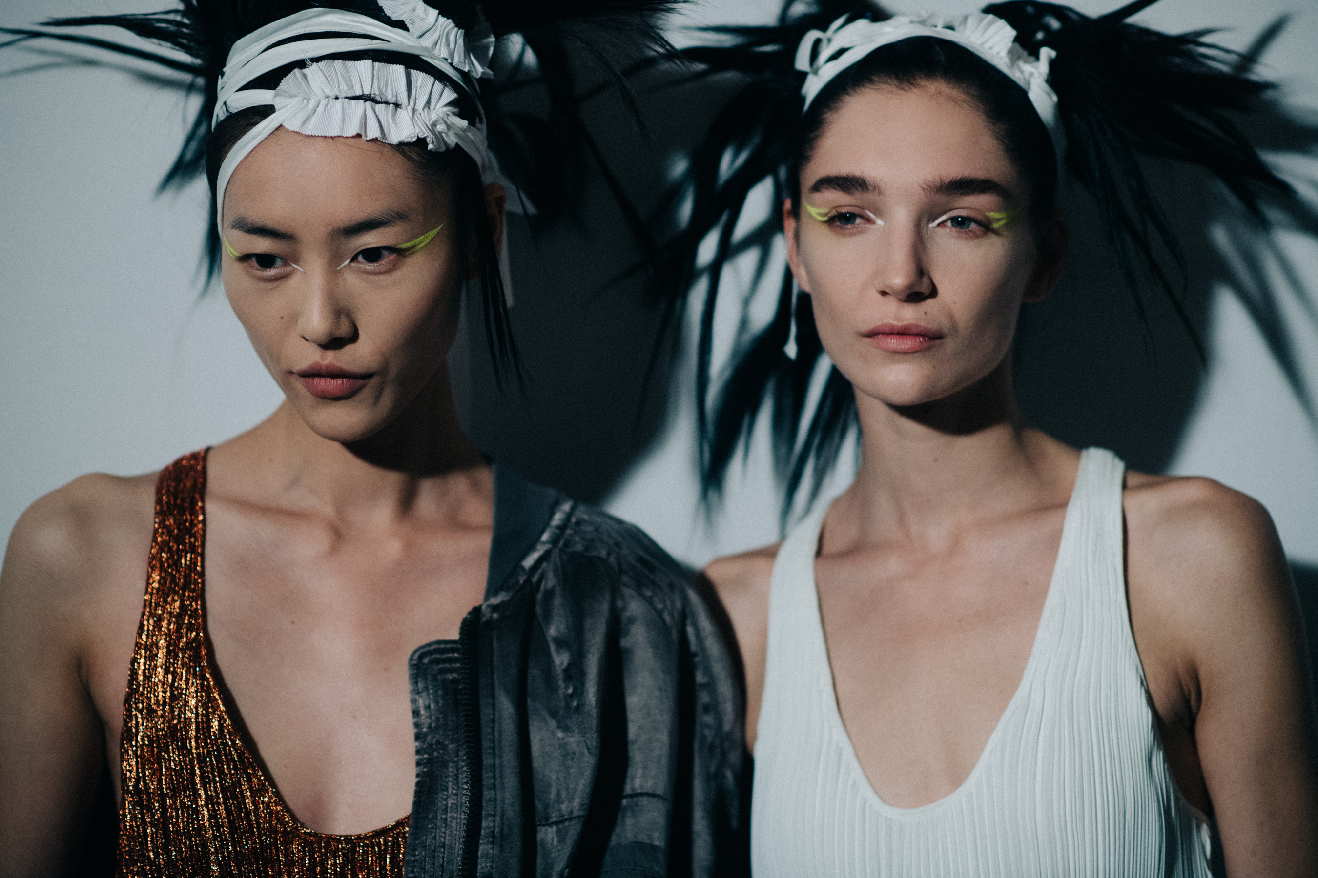 Two models with crazy hair