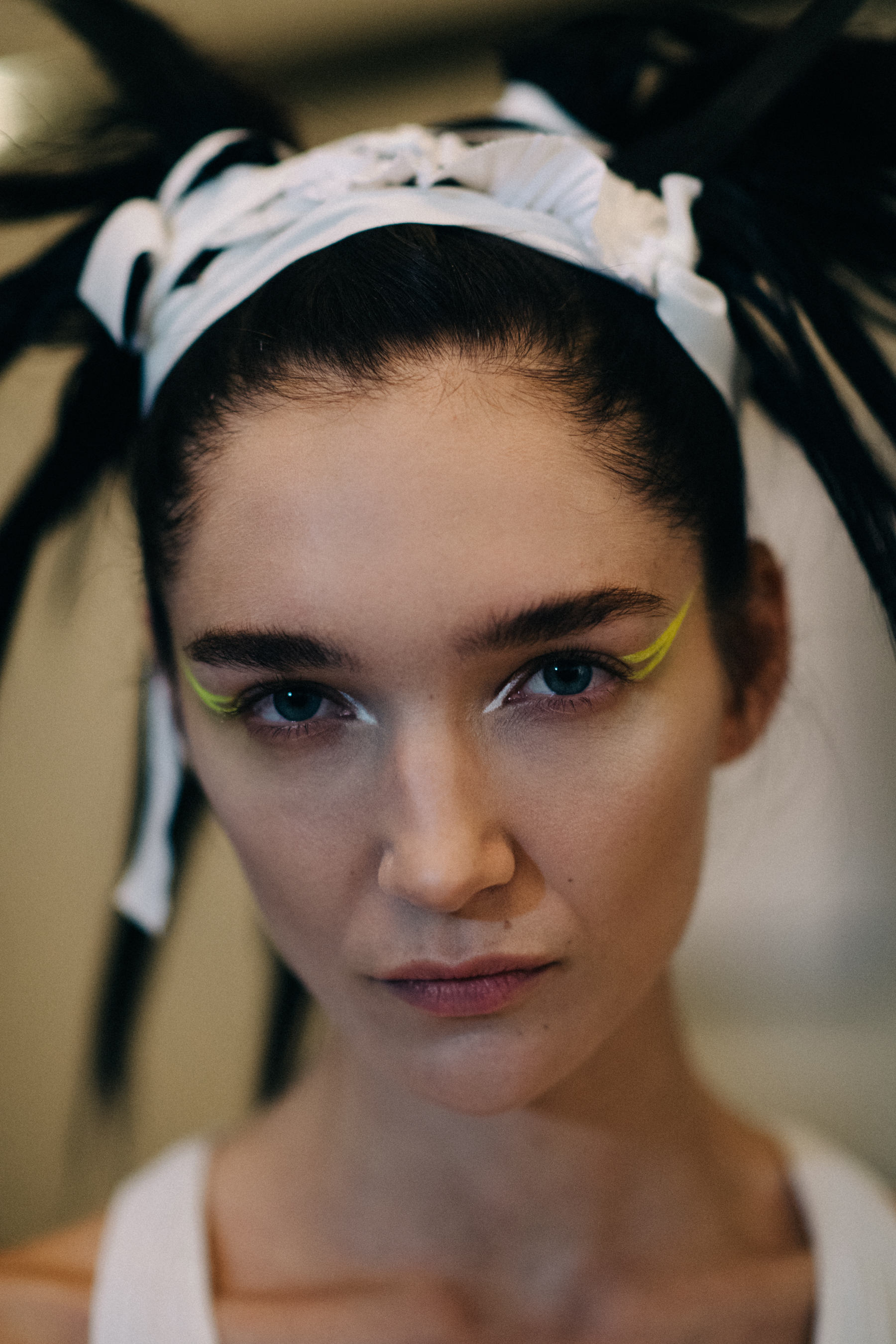 Portrait of a model with yellow make up