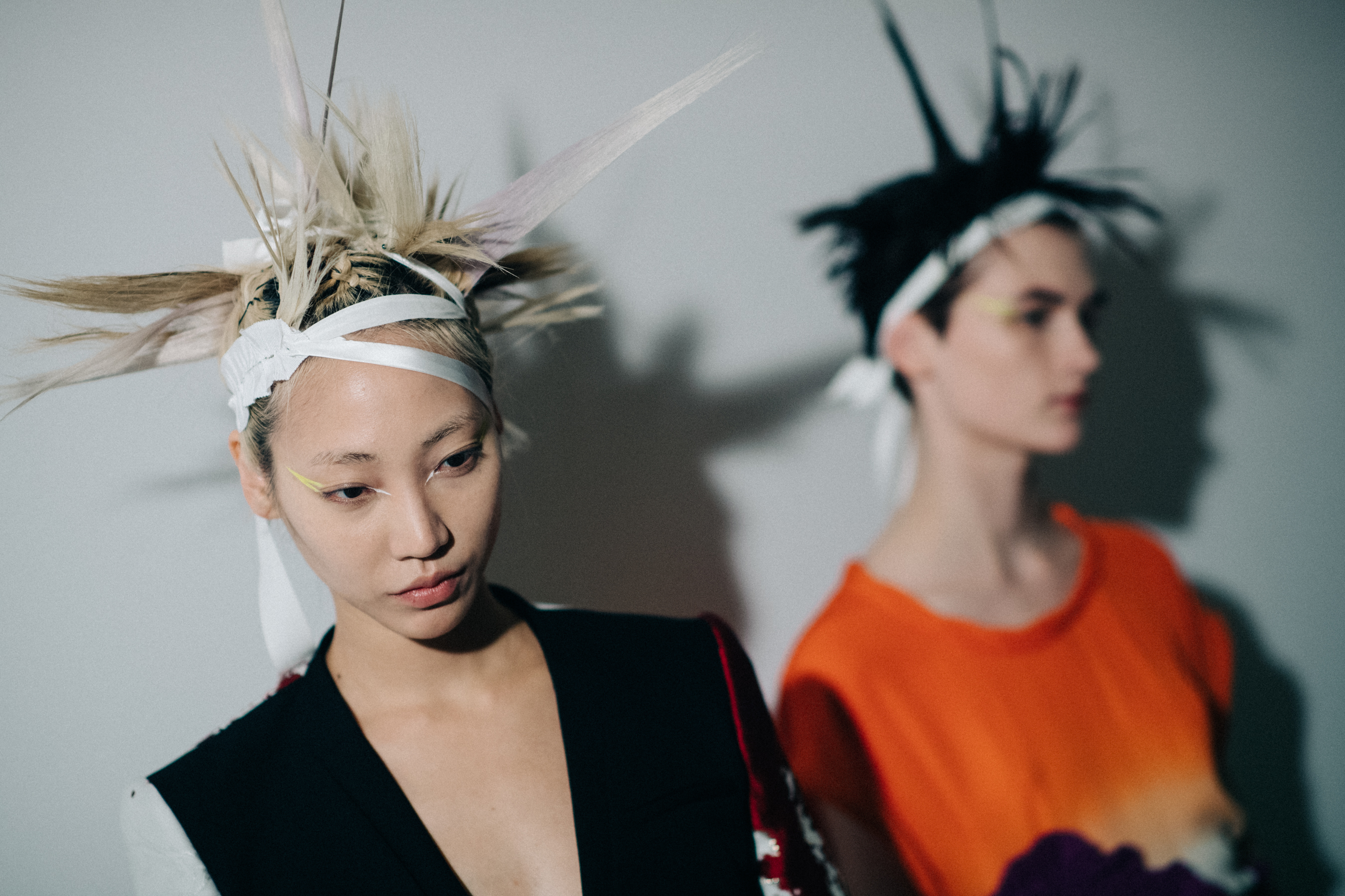 Two models with crazy hair style